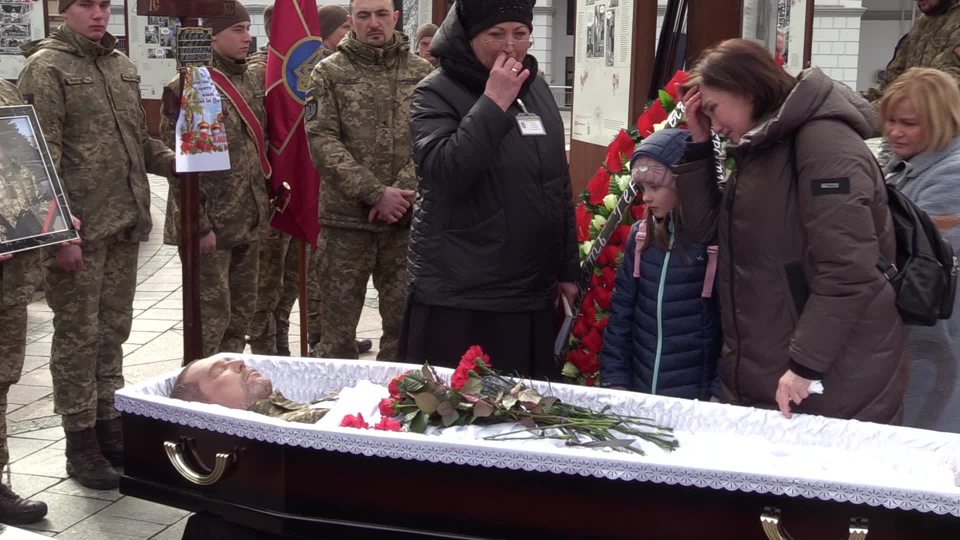 A farewell ceremony for Ukrainian soldiers, father and son who died at a fight with Russian troops near Bakhmut, in Kyiv