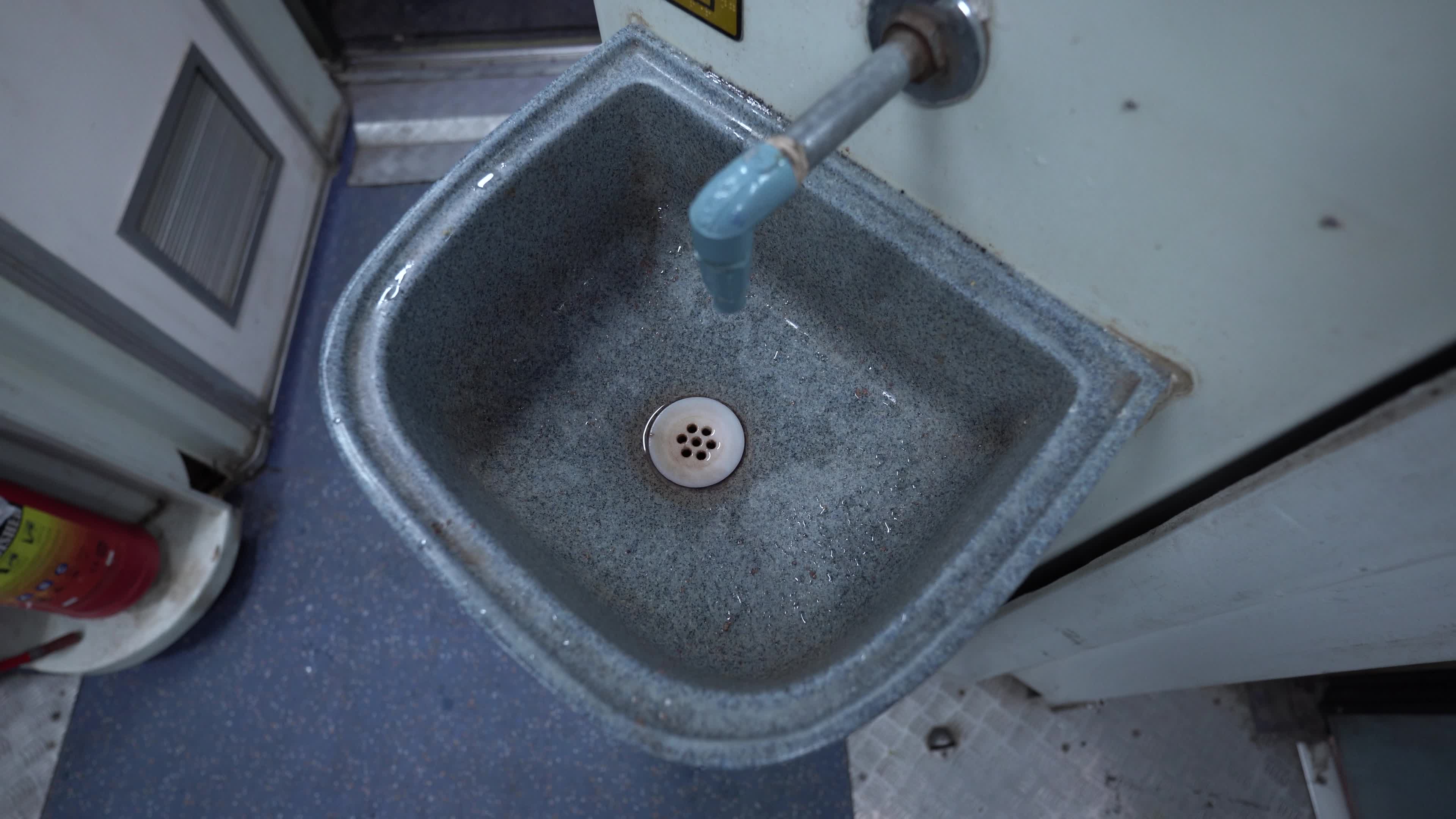 Wash basin area of a bogie of a passenger train of Indian Railways from Inside