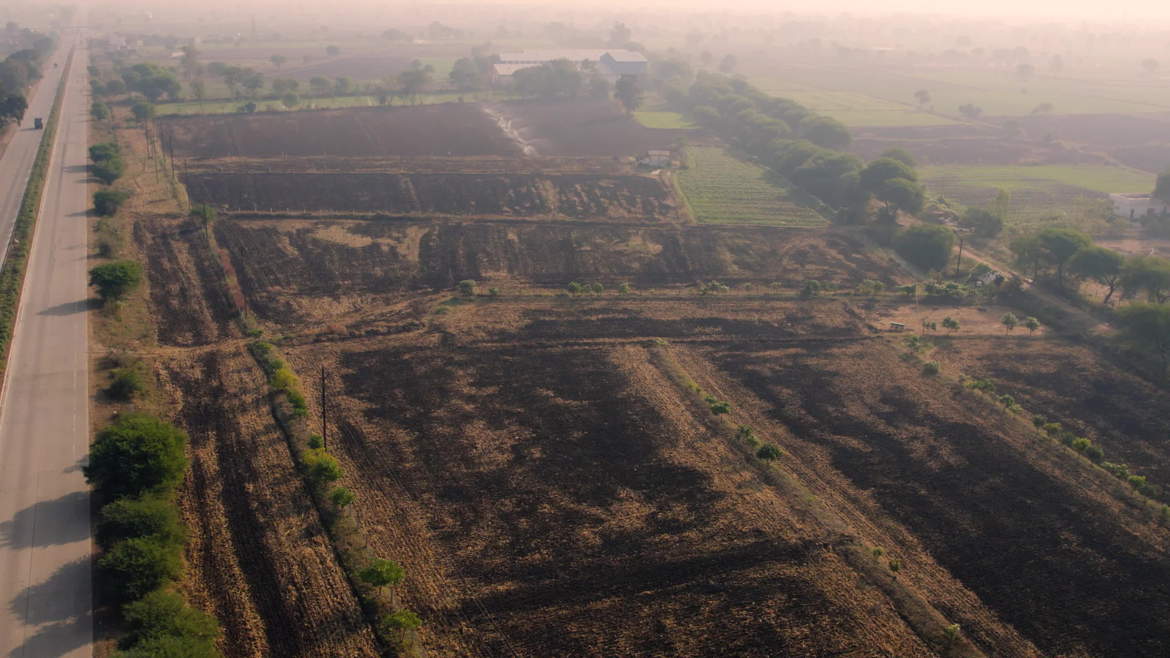 Burnt Farms & Water Sprinklers in the Indian state of Chhattisgarh (Date 12/12/2022)