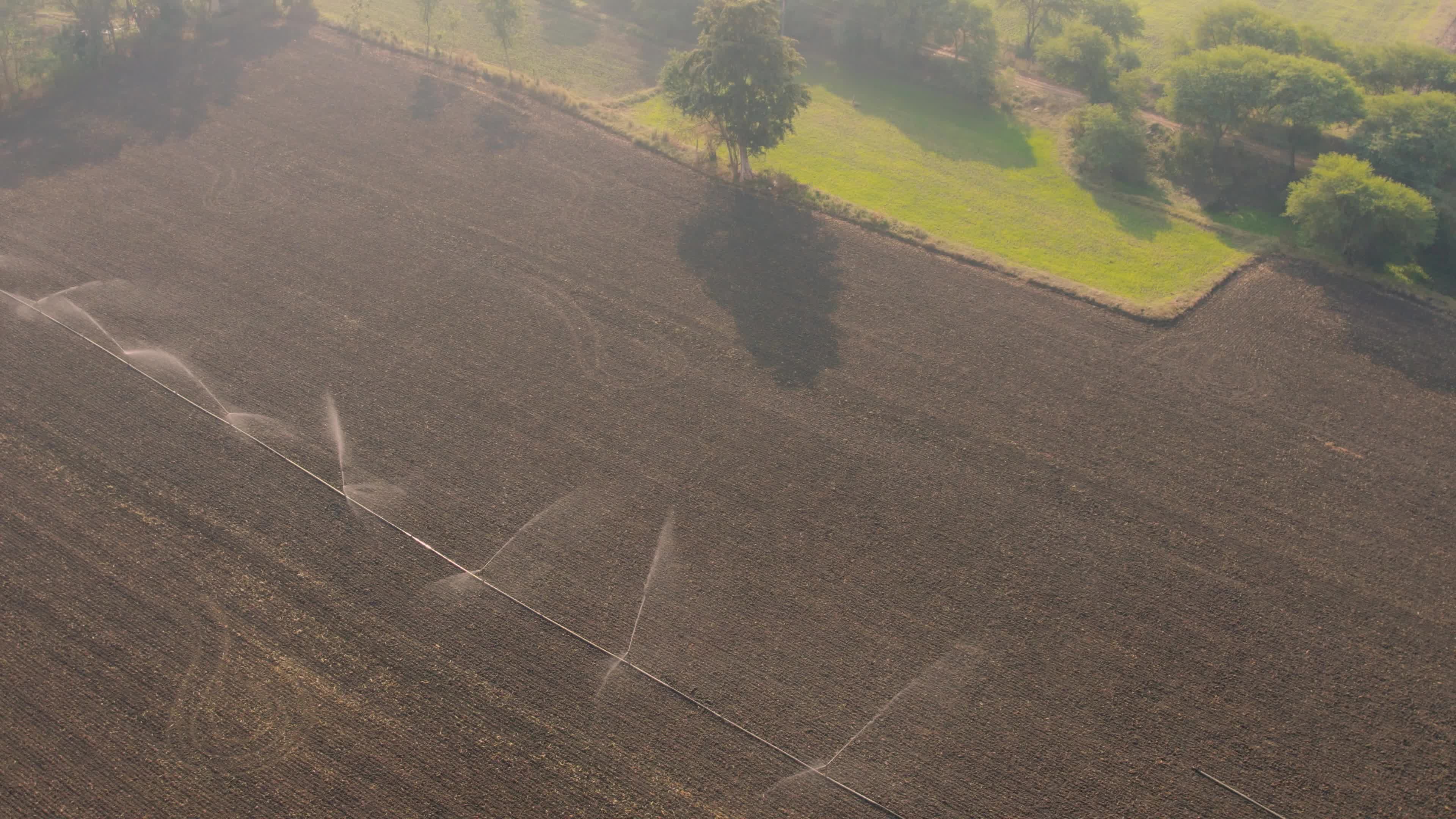 Burnt Farms & Water Sprinklers in the Indian state of Chhattisgarh (Date 12/12/2022)