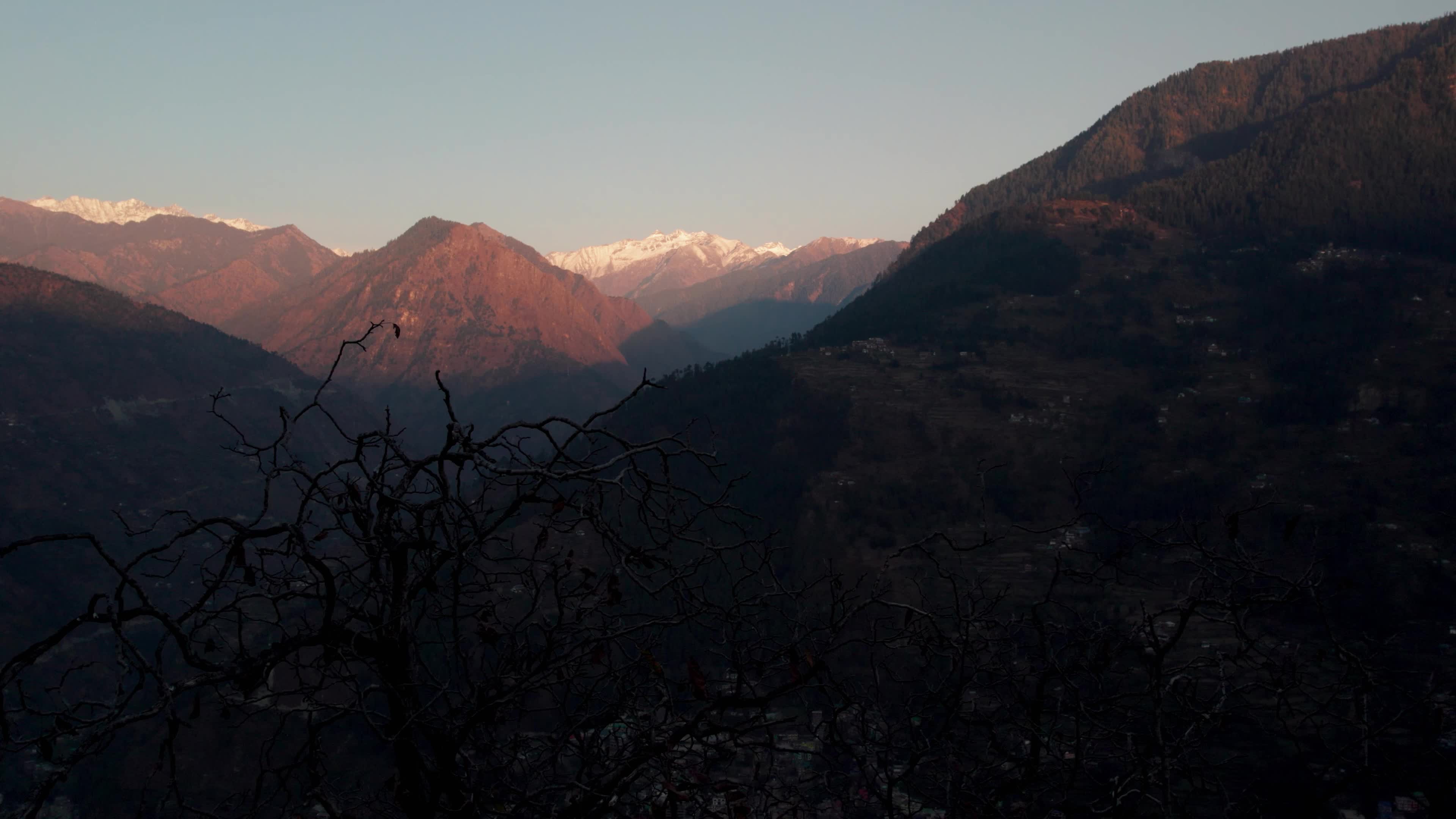 Aerial 4K Drone Footage of Breathtaking Sunset in Himachal Pradesh - Heaven-Like View of Snowcapped Peaks and Tirthan Valley