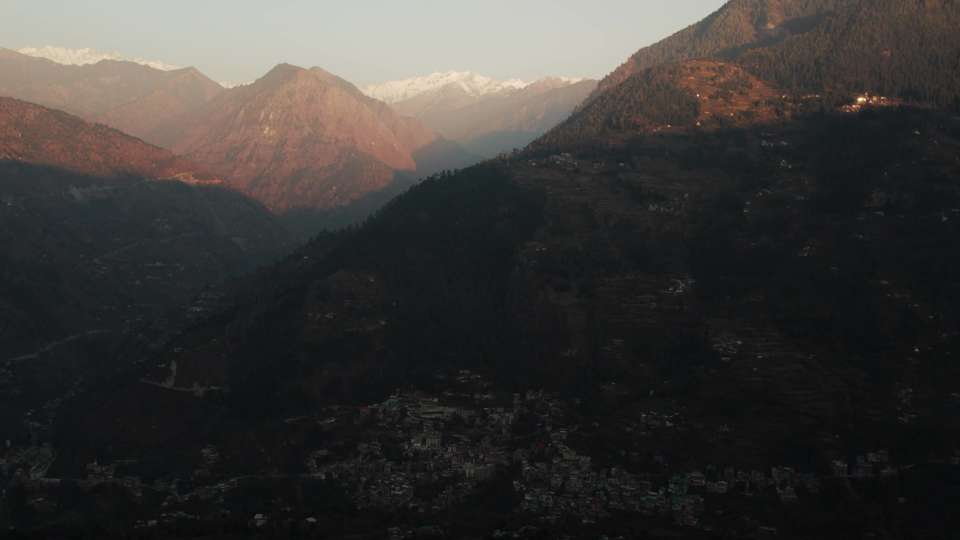Aerial 4K Drone Footage of Breathtaking Sunset in Himachal Pradesh - Heaven-Like View of Snowcapped Peaks and Tirthan Valley