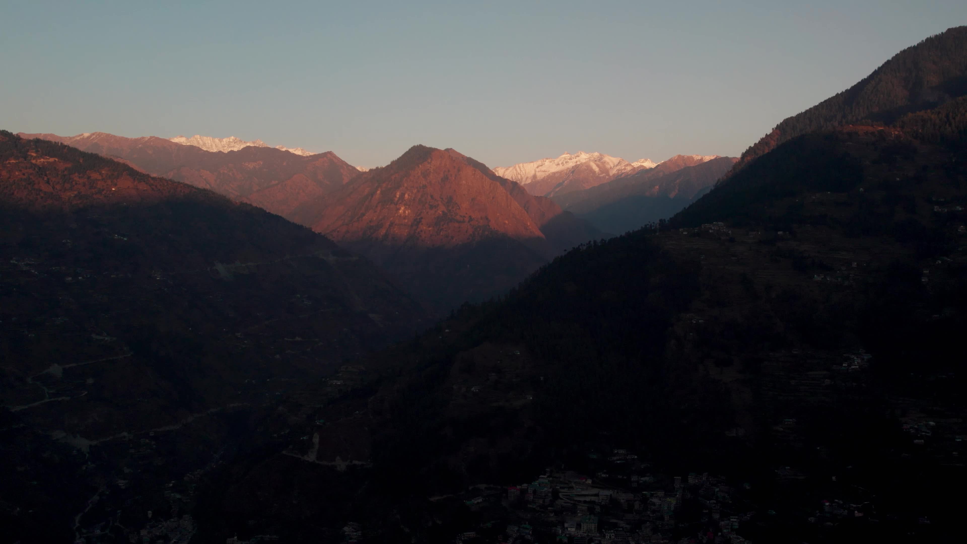 Aerial 4K Drone Footage of Breathtaking Sunset in Himachal Pradesh - Heaven-Like View of Snowcapped Peaks and Tirthan Valley