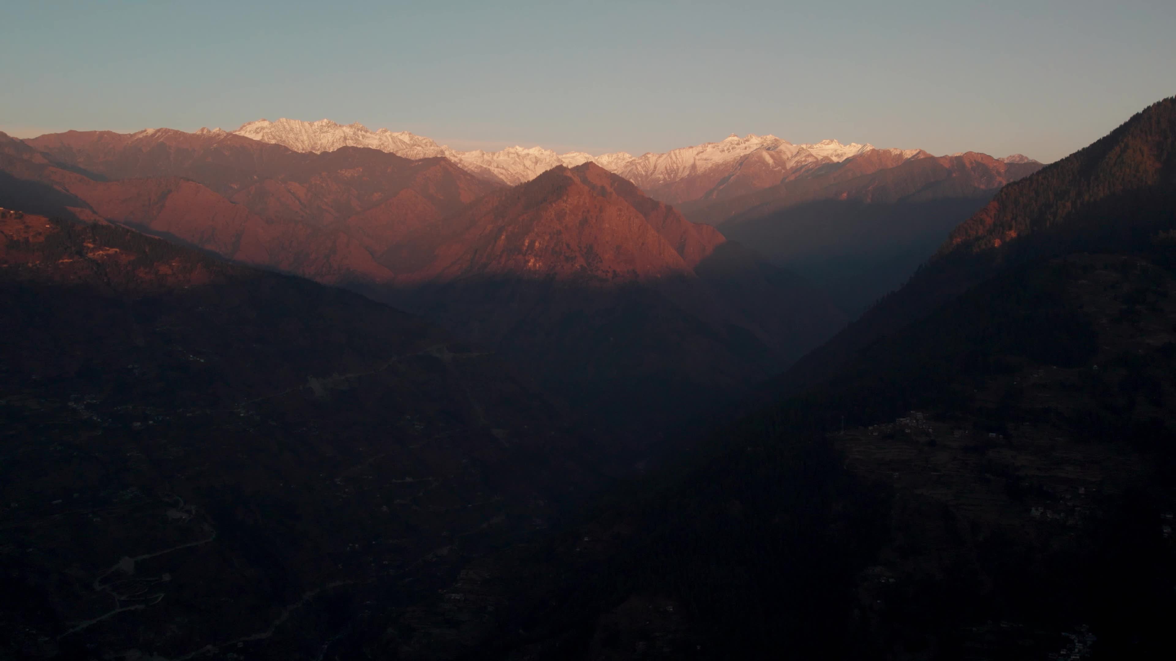 Aerial 4K Drone Footage of Breathtaking Sunset in Himachal Pradesh - Heaven-Like View of Snowcapped Peaks and Tirthan Valley