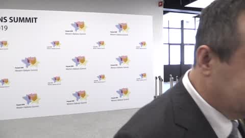 Ivica Dacic speaks with journalists at Western Balkans Summit