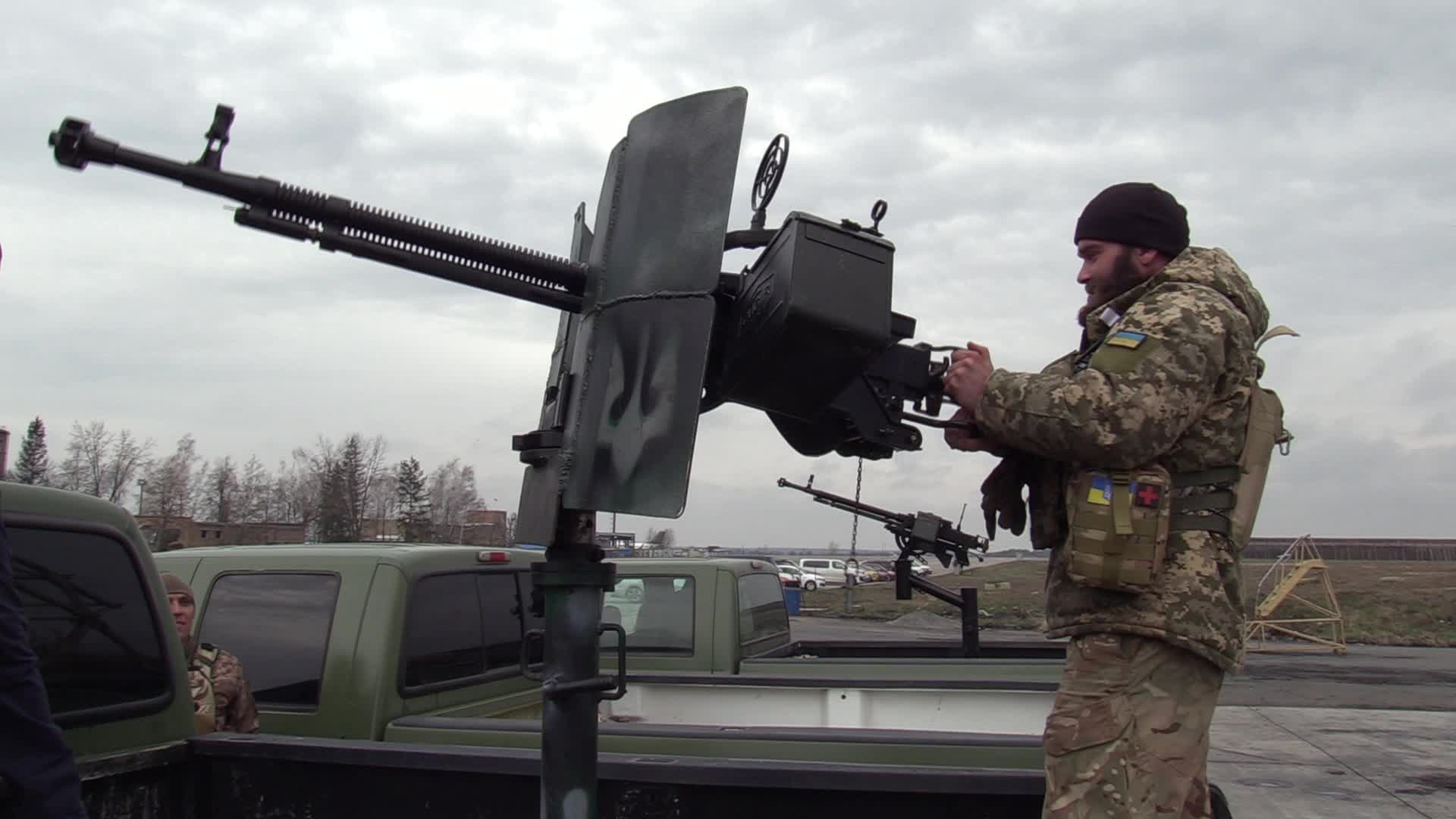 A handover ceremony of vehicles with machine guns for mobile anti-aircraft groups in Ukraine, amid Russia's invasion of Ukraine