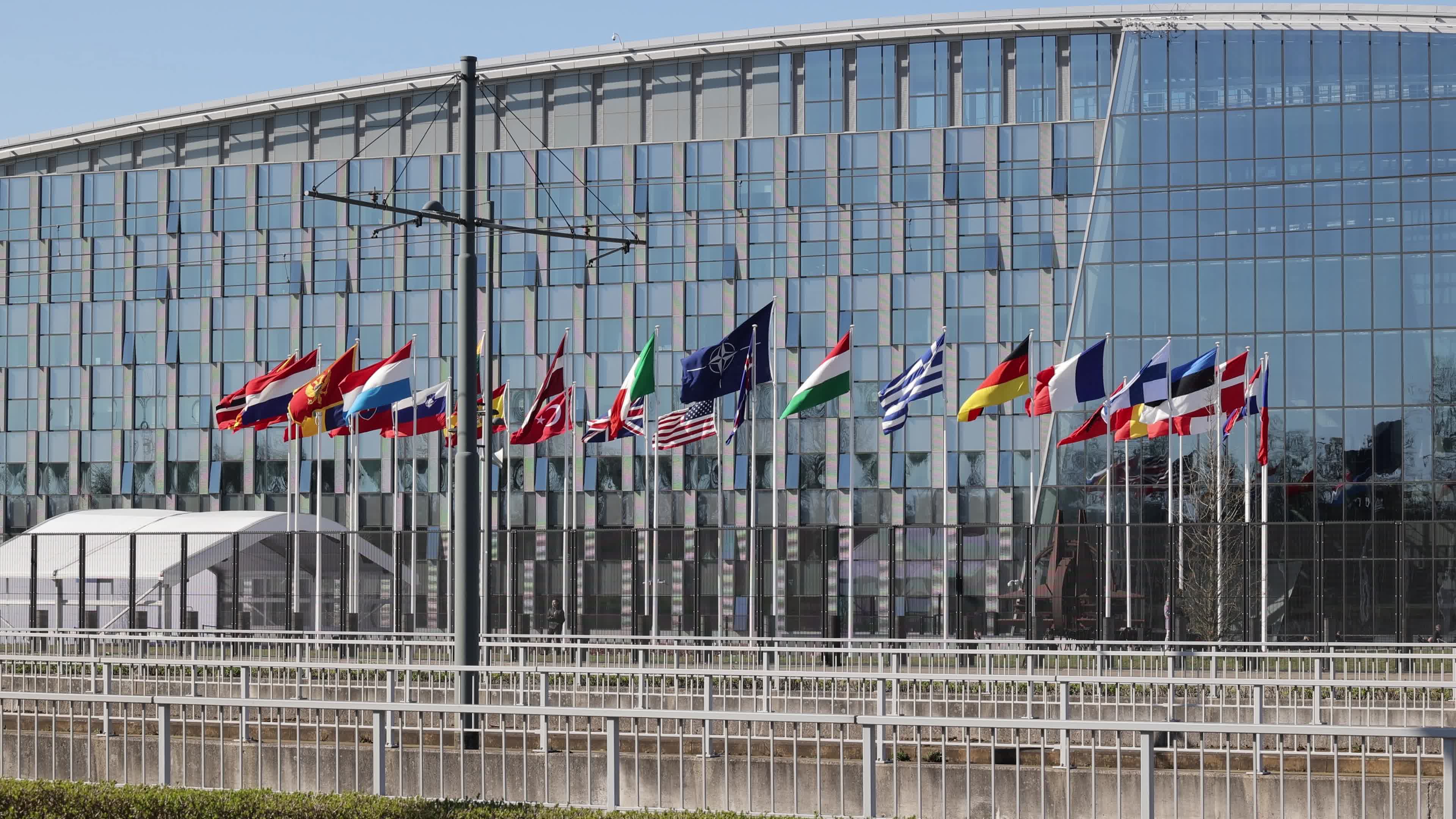 Flag raising ceremony as NATO adds Finland