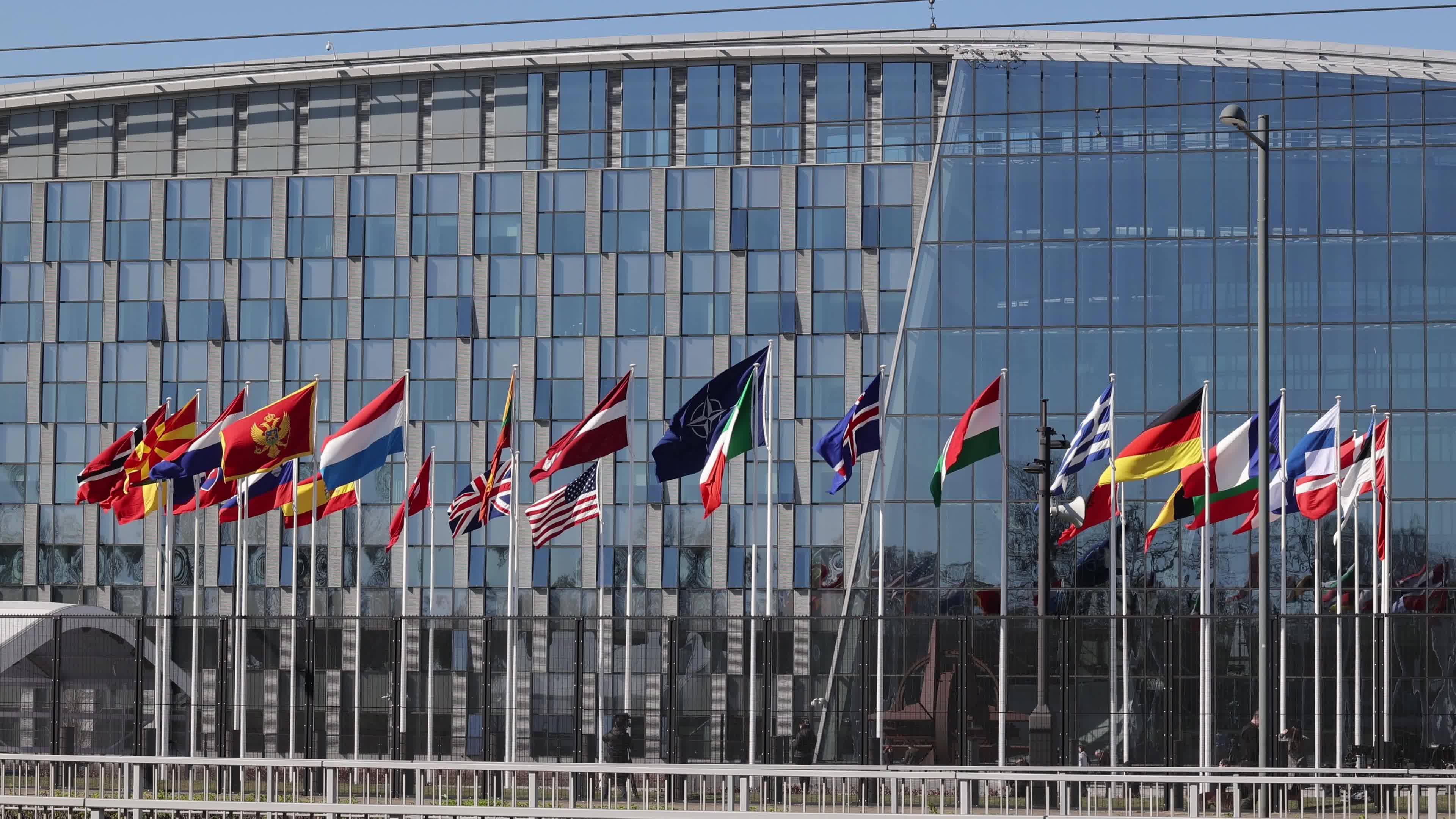 Flag raising ceremony as NATO adds Finland
