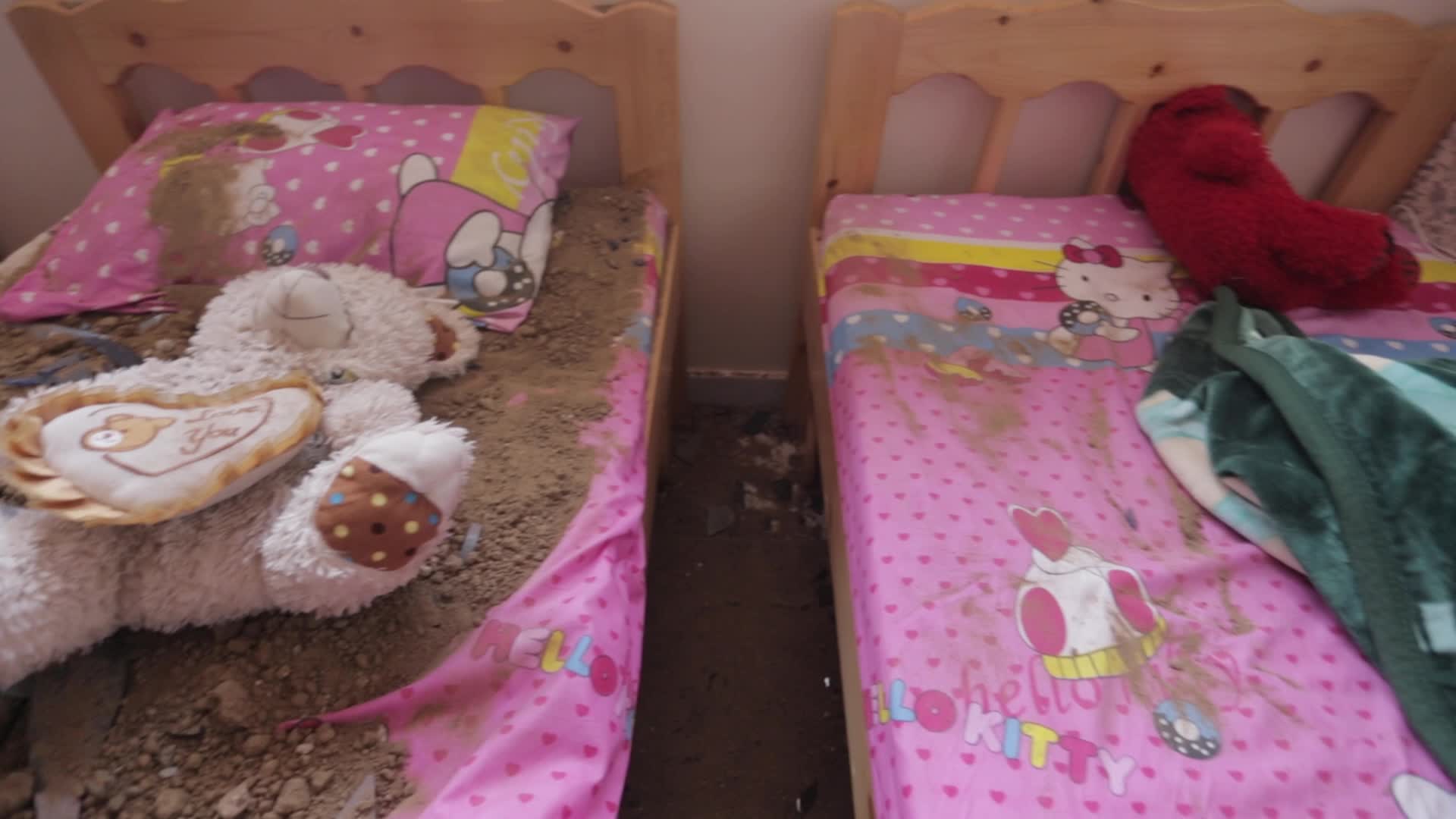 Palestinians inspect damage after air strikes in Gaza
