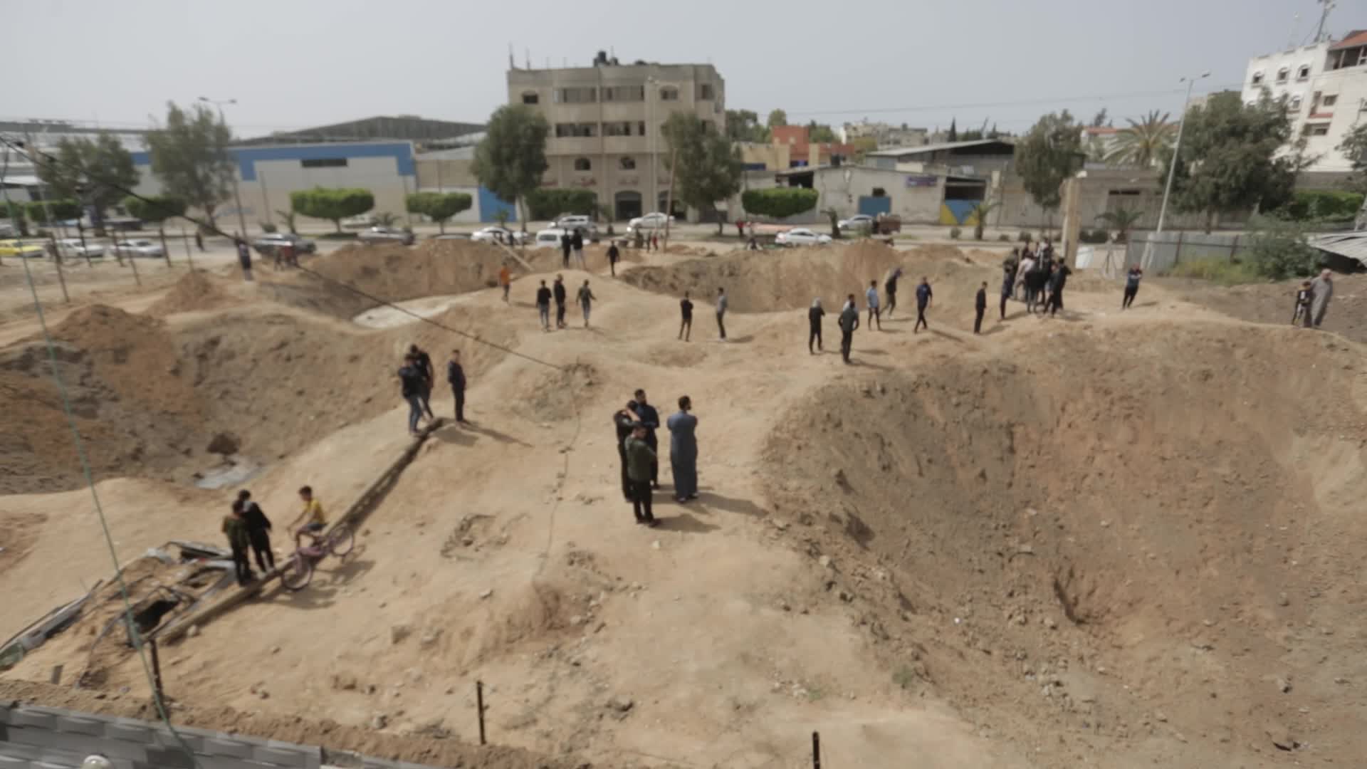 Palestinians inspect damage after air strikes in Gaza