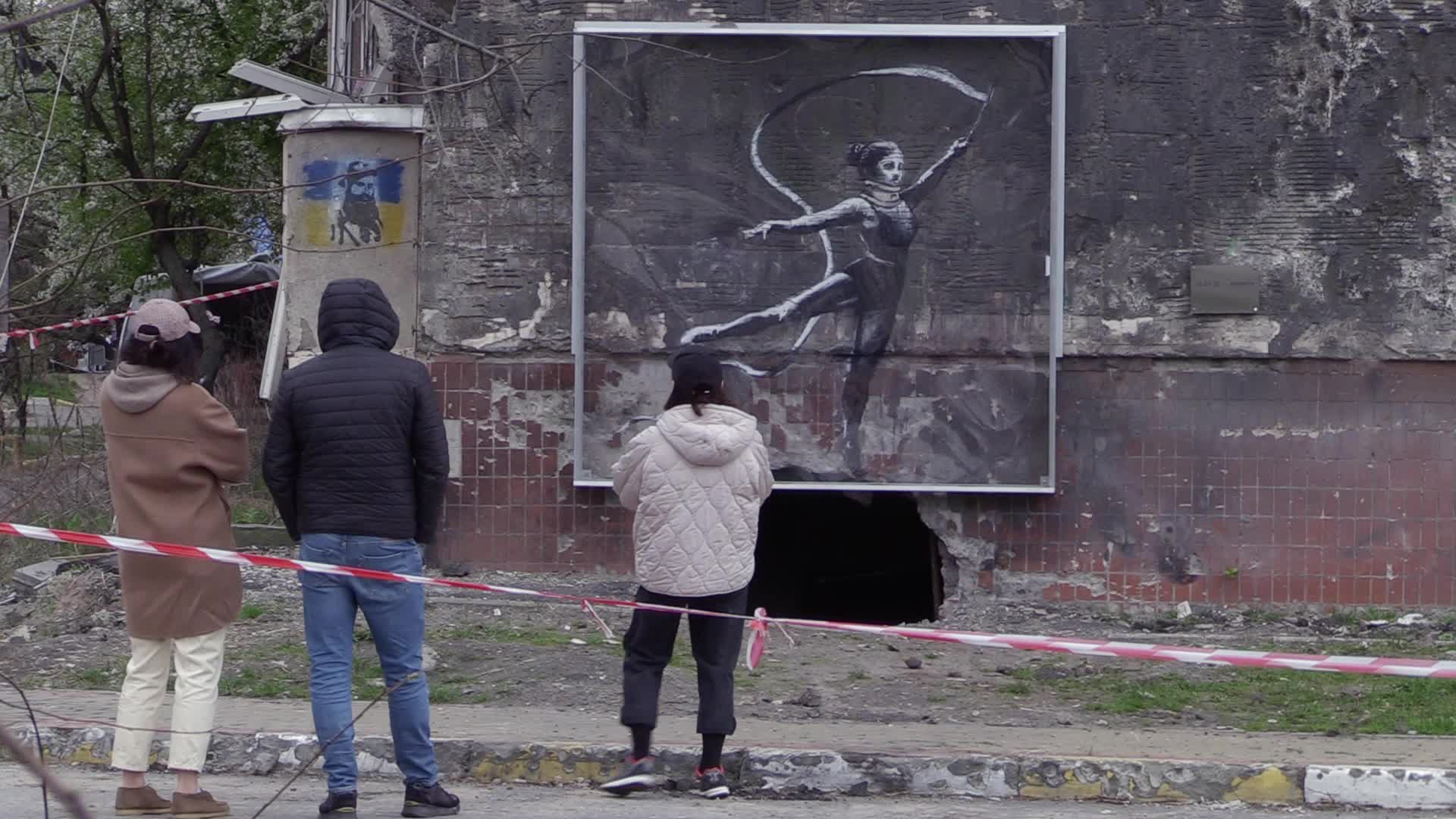 Graffiti by British street artist Banksy to be preserved as demolition of buildings damaged during the war begins in Irpin, amid Russia's invasion of Ukraine.