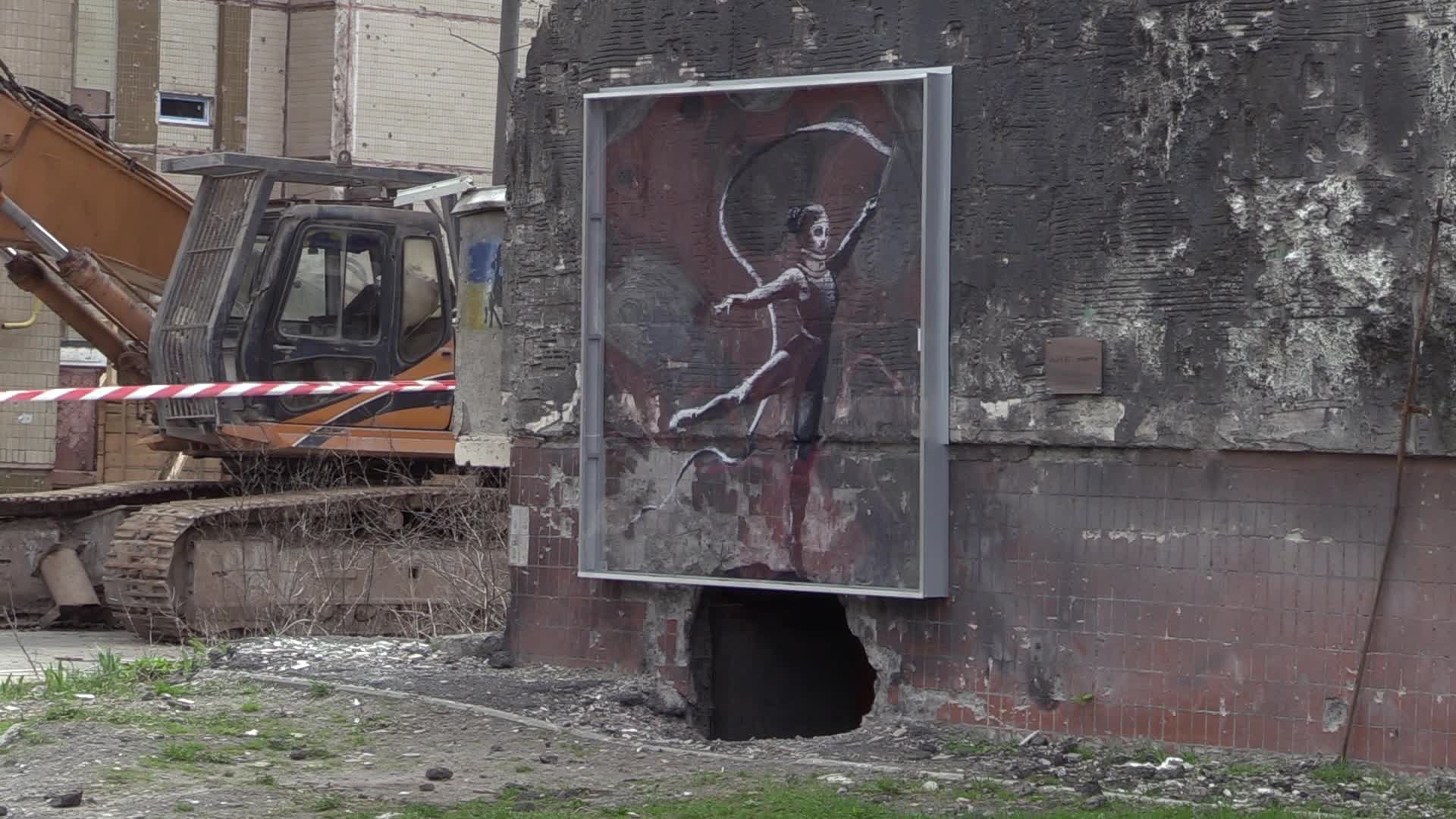 Graffiti by British street artist Banksy to be preserved as demolition of buildings damaged during the war begins in Irpin, amid Russia's invasion of Ukraine.