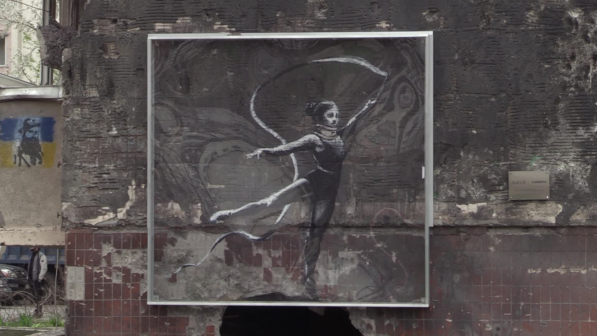 Graffiti by British street artist Banksy to be preserved as demolition of buildings damaged during the war begins in Irpin, amid Russia's invasion of Ukraine.