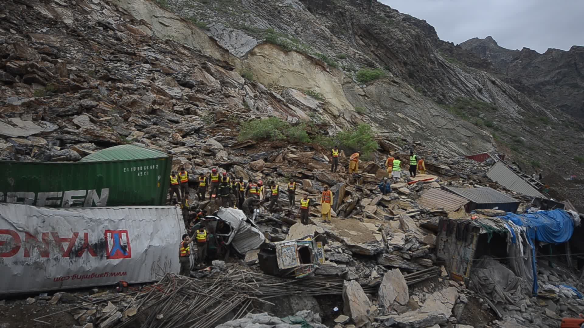 Landslide burried trucks near the Afghan border in Toorkham
