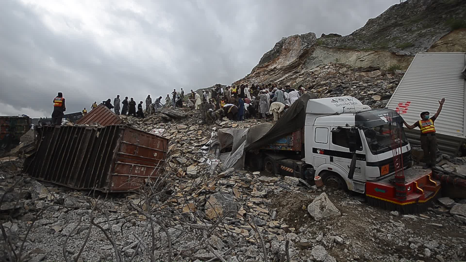 Landslide burried trucks near the Afghan border in Toorkham
