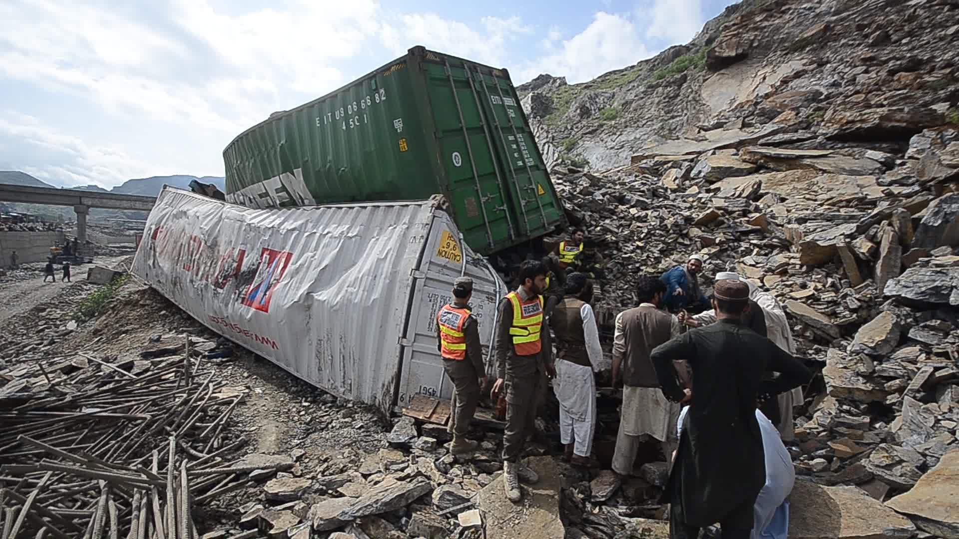 Landslide burried trucks near the Afghan border in Toorkham

