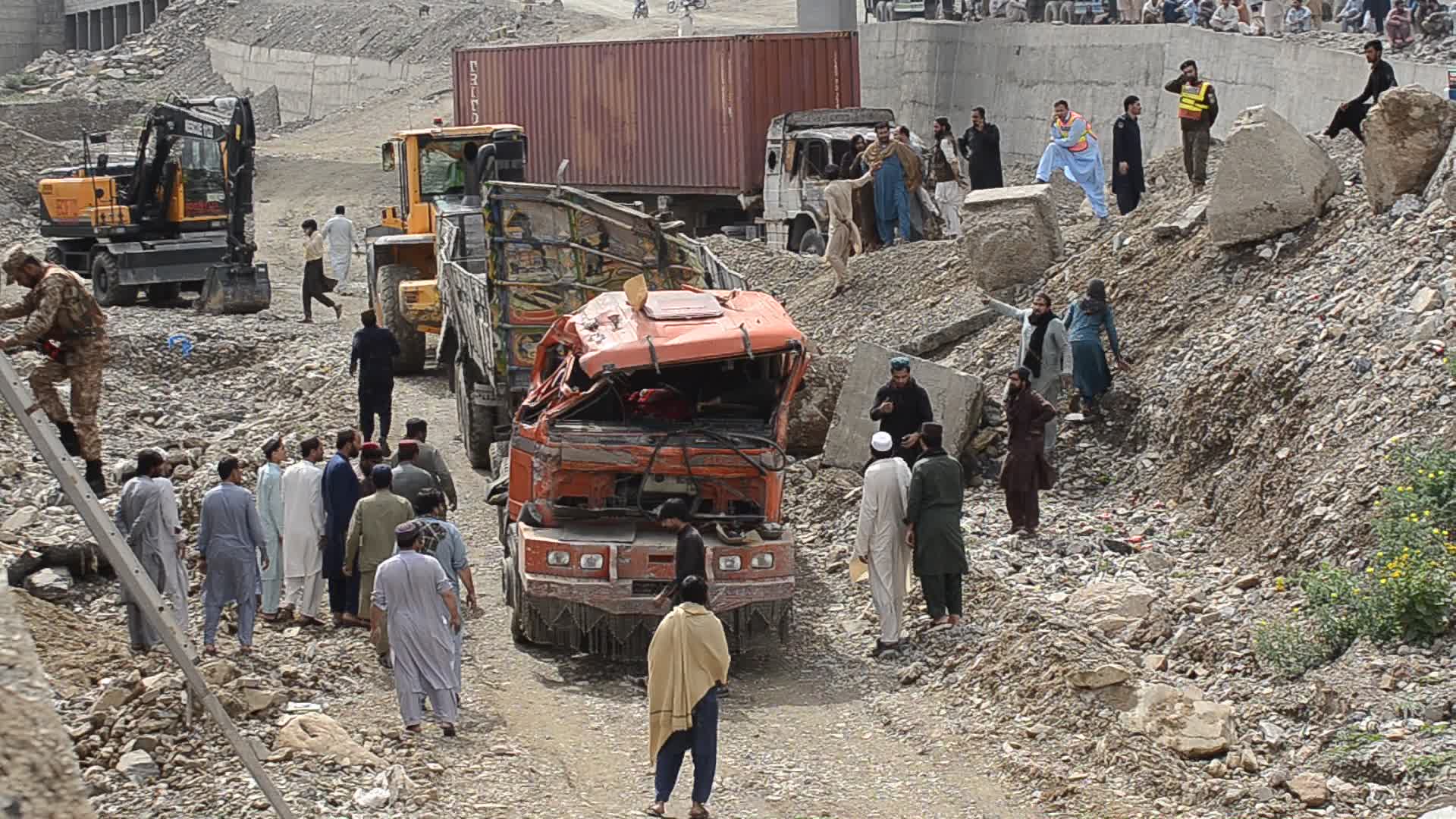 Landslide burried trucks near the Afghan border in Toorkham
