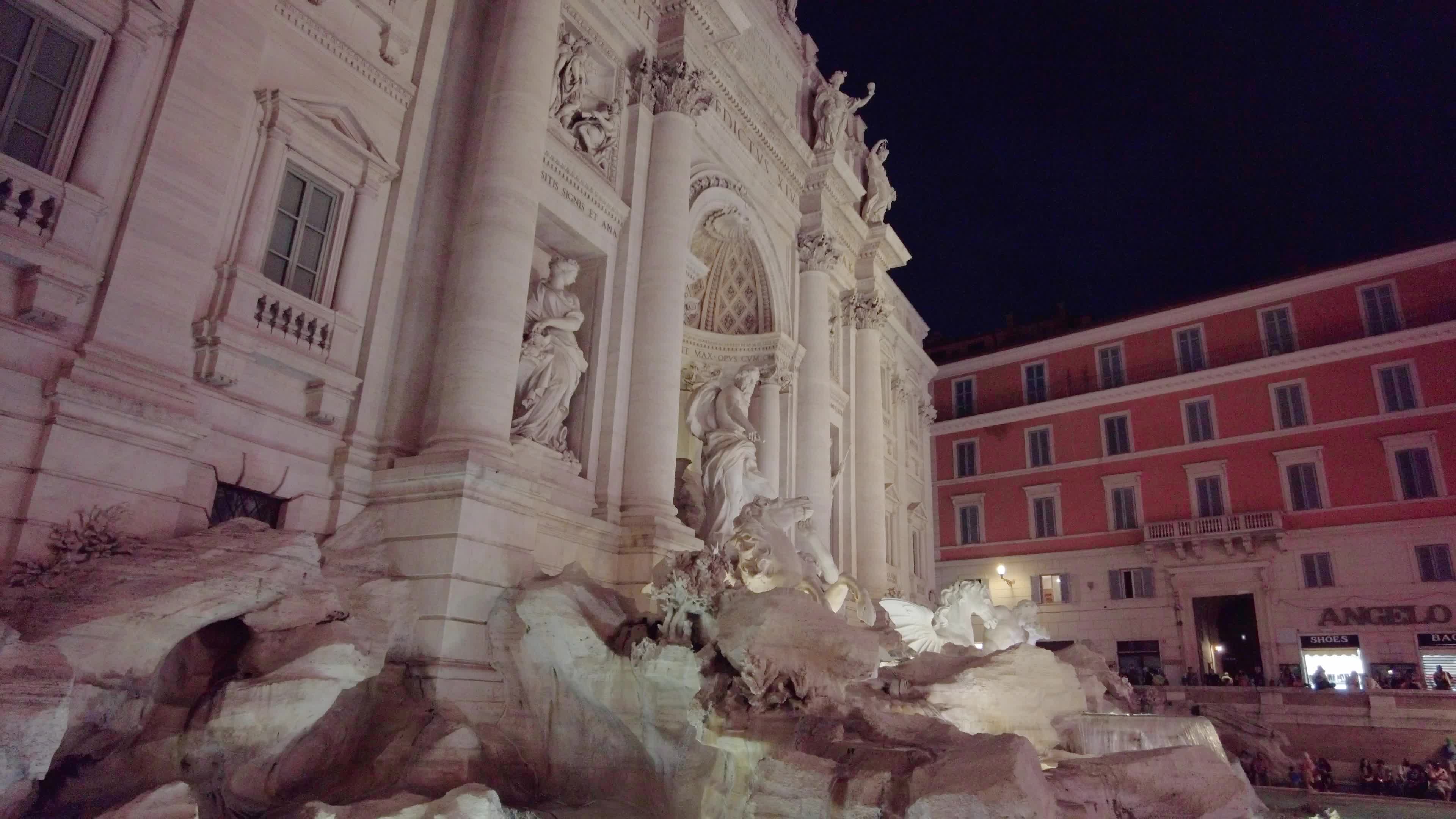 Trevi Fountains With Tourists In Rome, Italy
