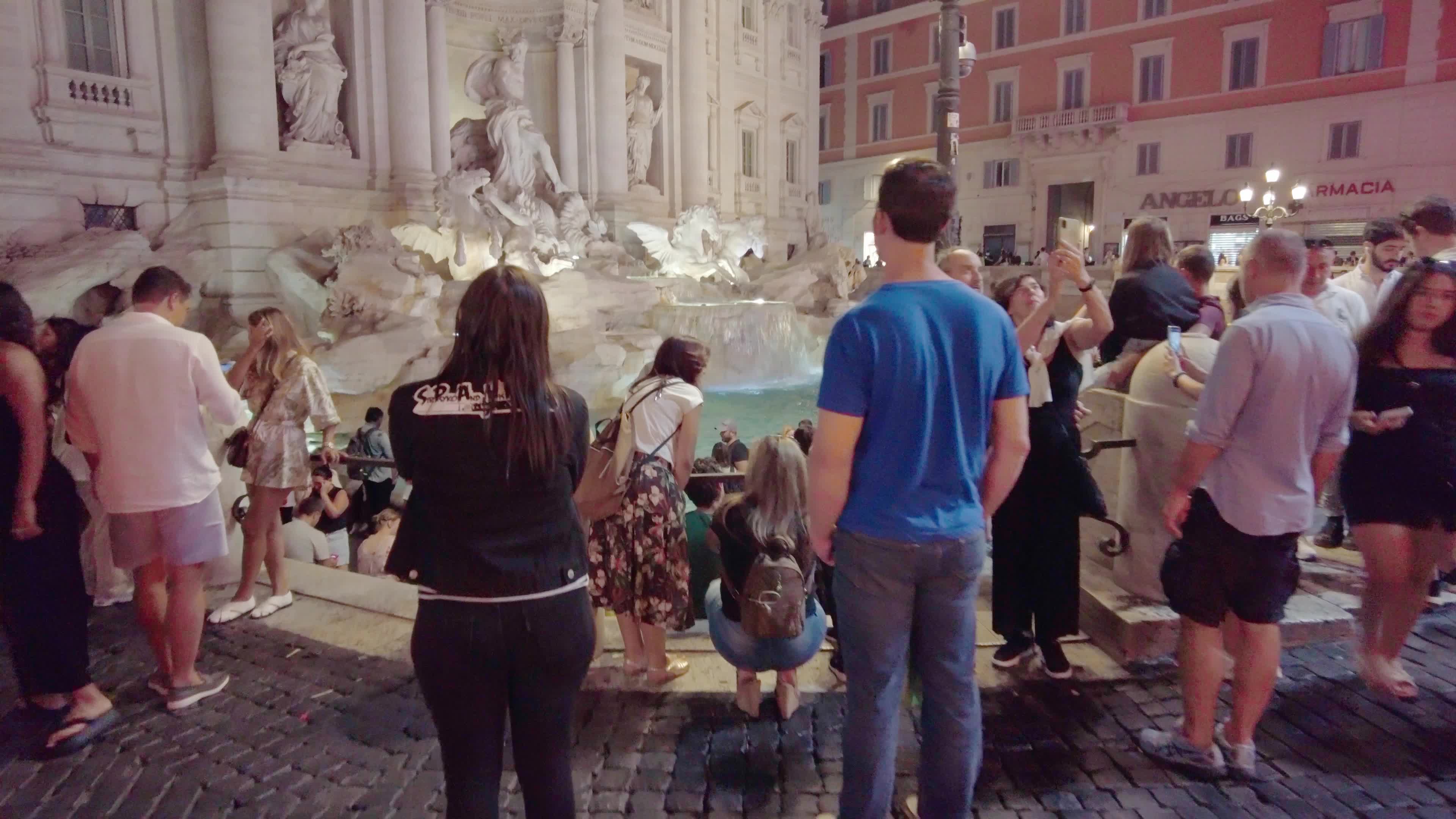 Trevi Fountains With Tourists In Rome, Italy
