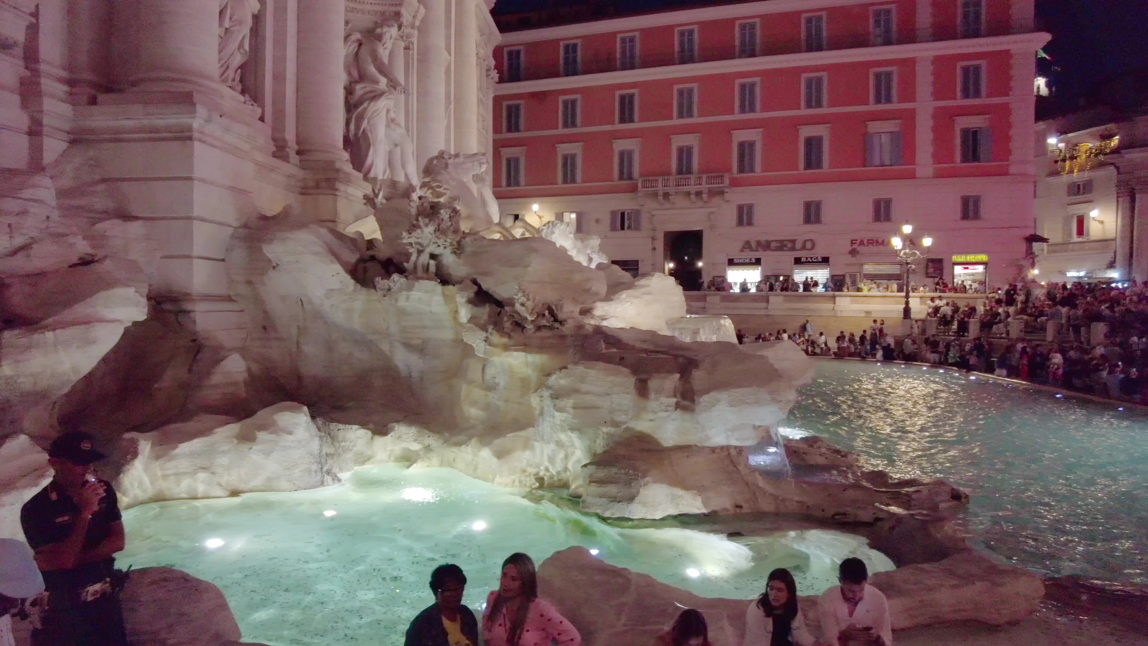 Trevi Fountains With Tourists In Rome, Italy