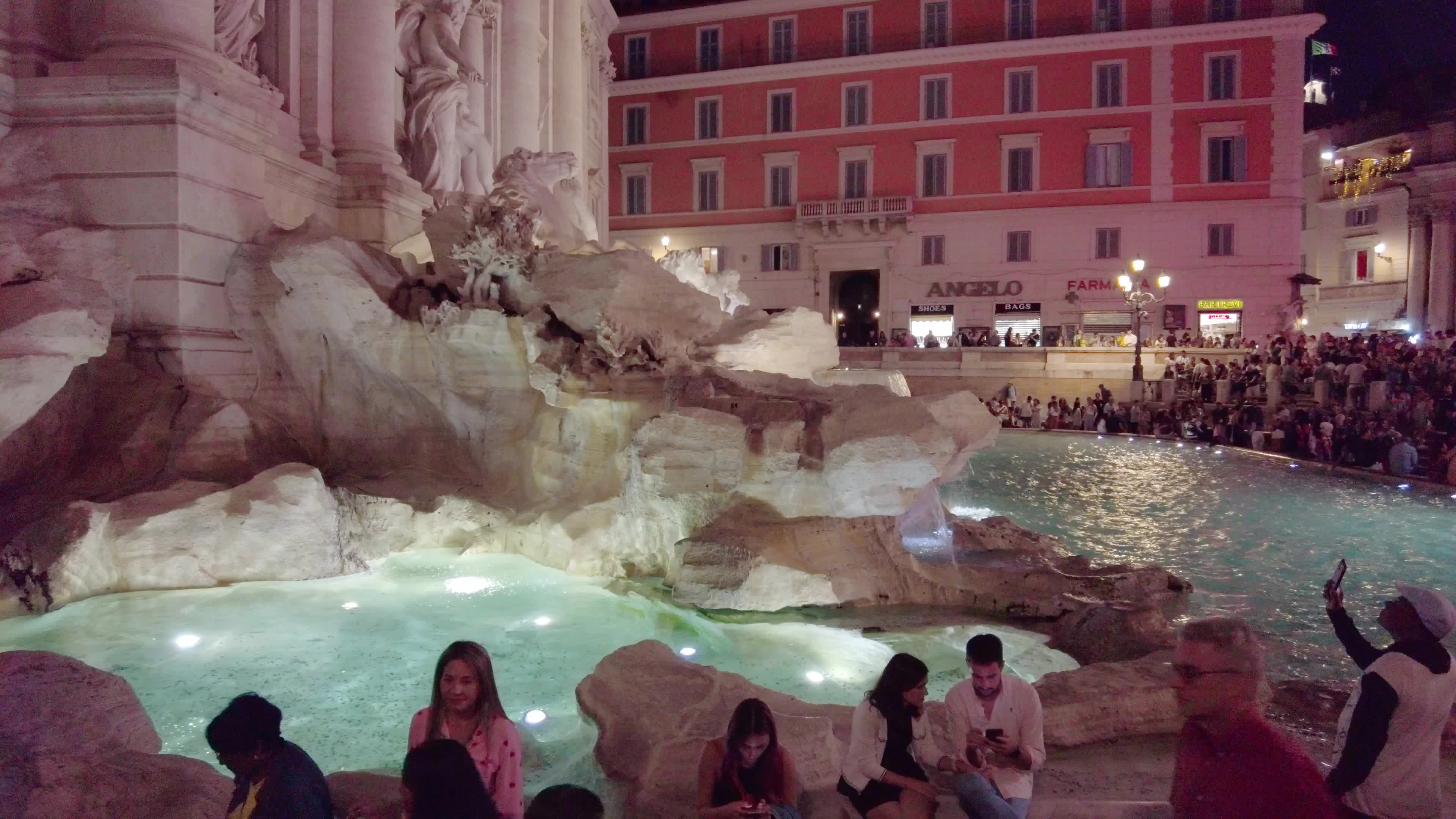 Trevi Fountains With Tourists In Rome, Italy