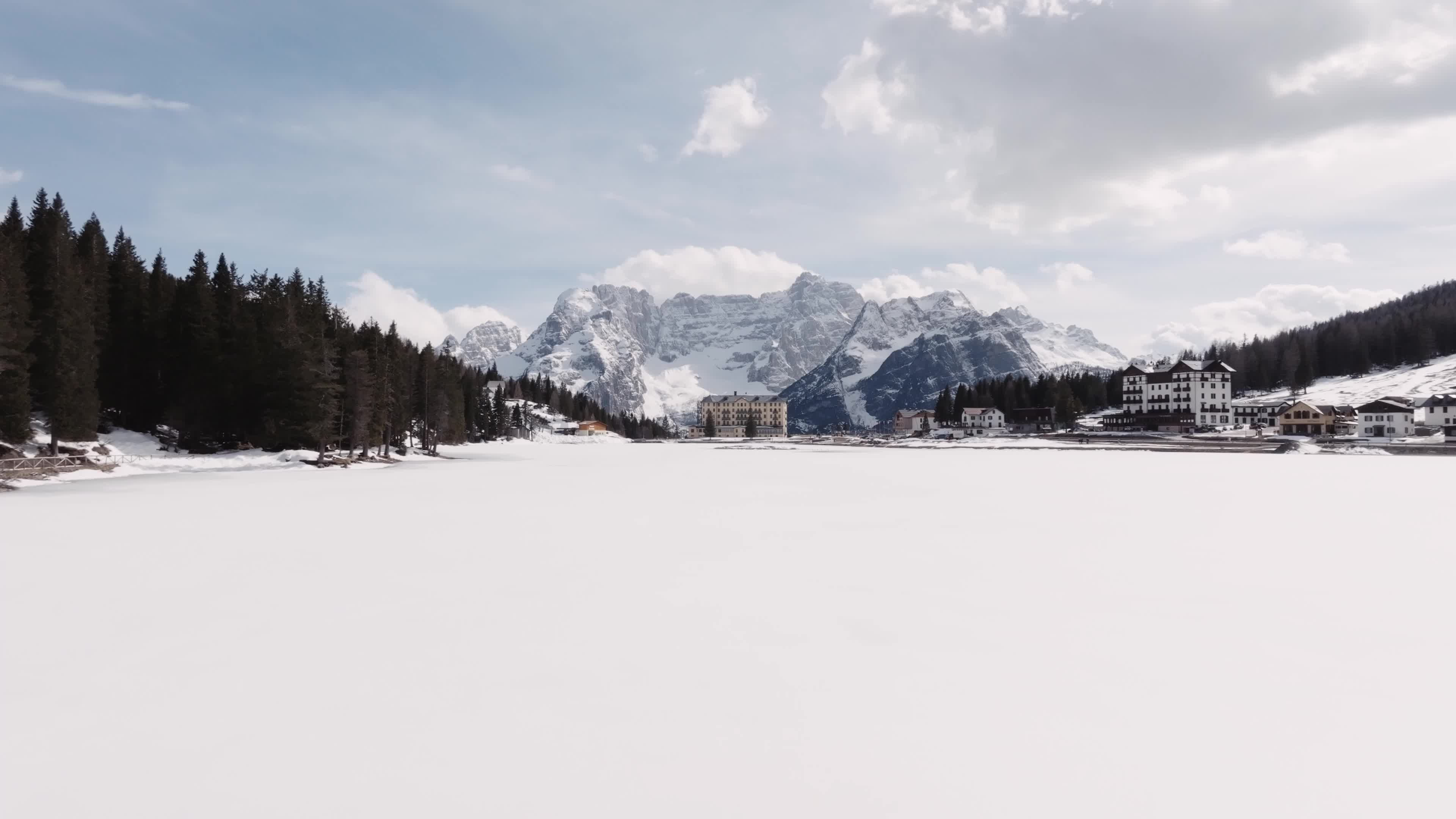 Drone View of Frozen Lake Misurina Covered in Snow