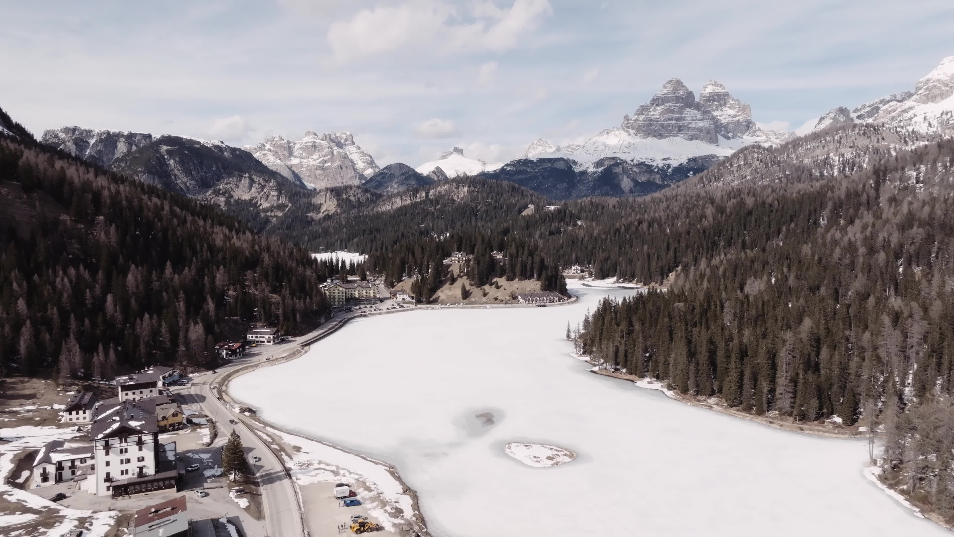 Drone View of Frozen Lake Misurina Covered in Snow