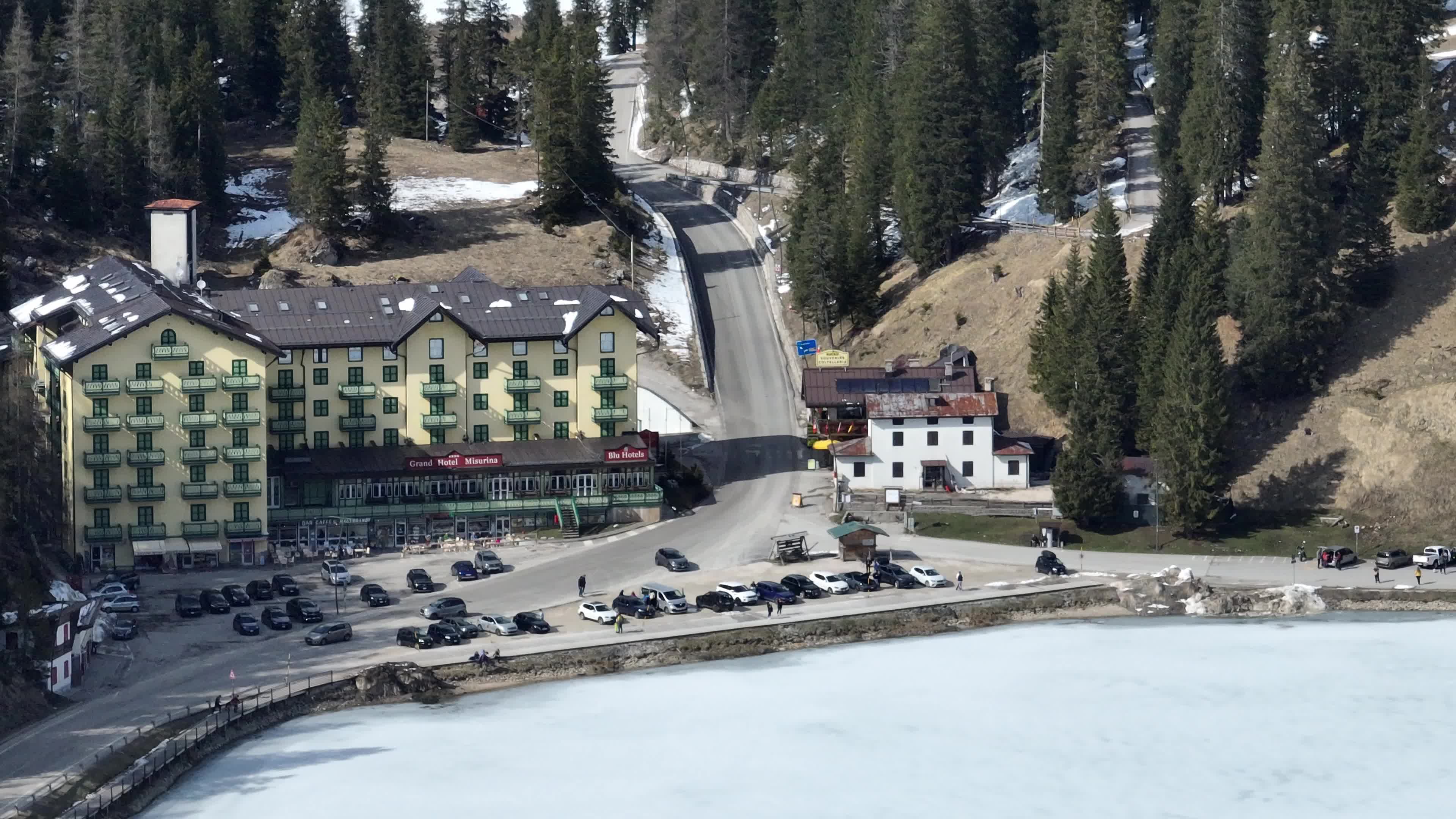 Drone View of Frozen Lake Misurina Covered in Snow