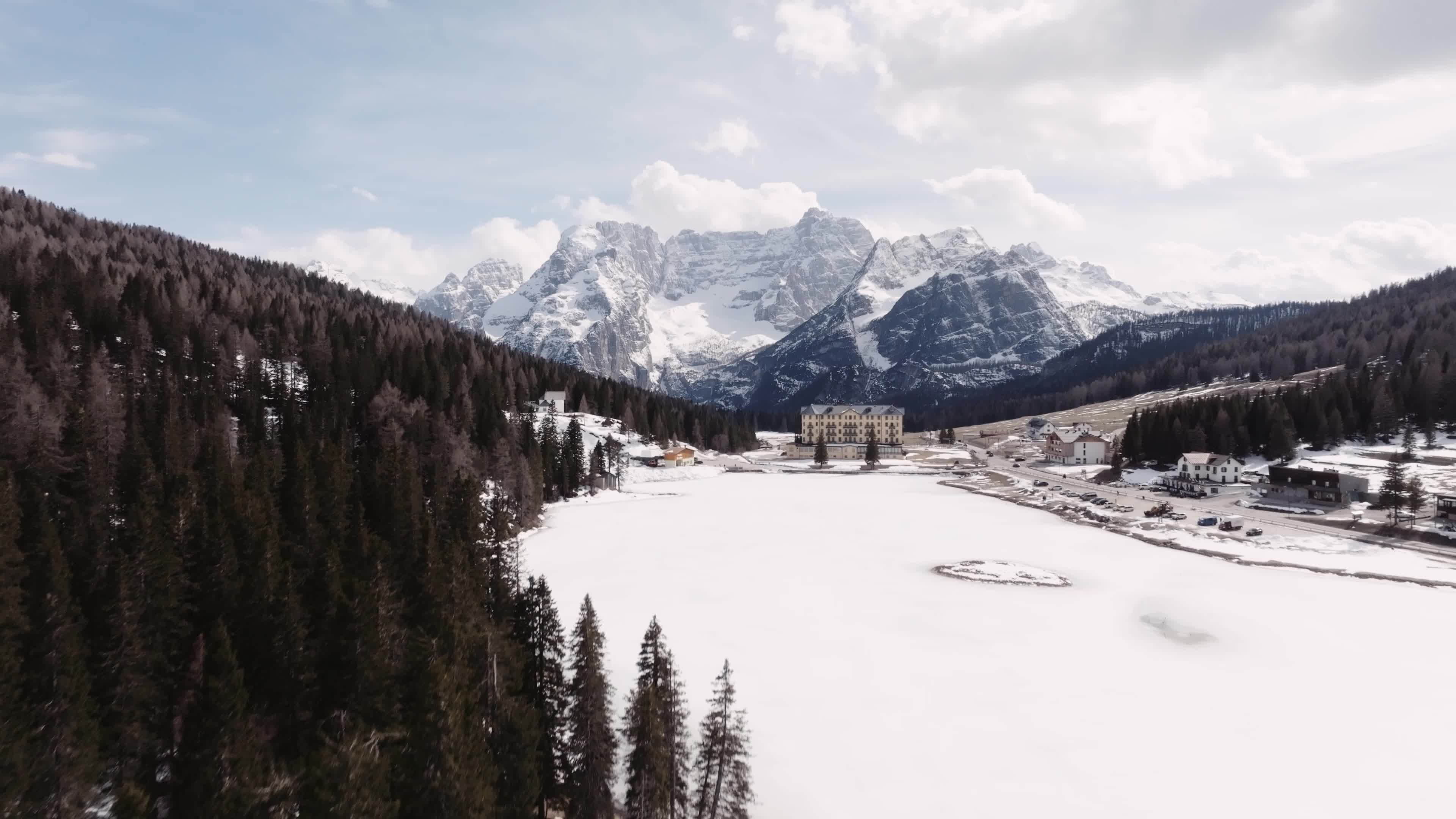 Drone View of Frozen Lake Misurina Covered in Snow