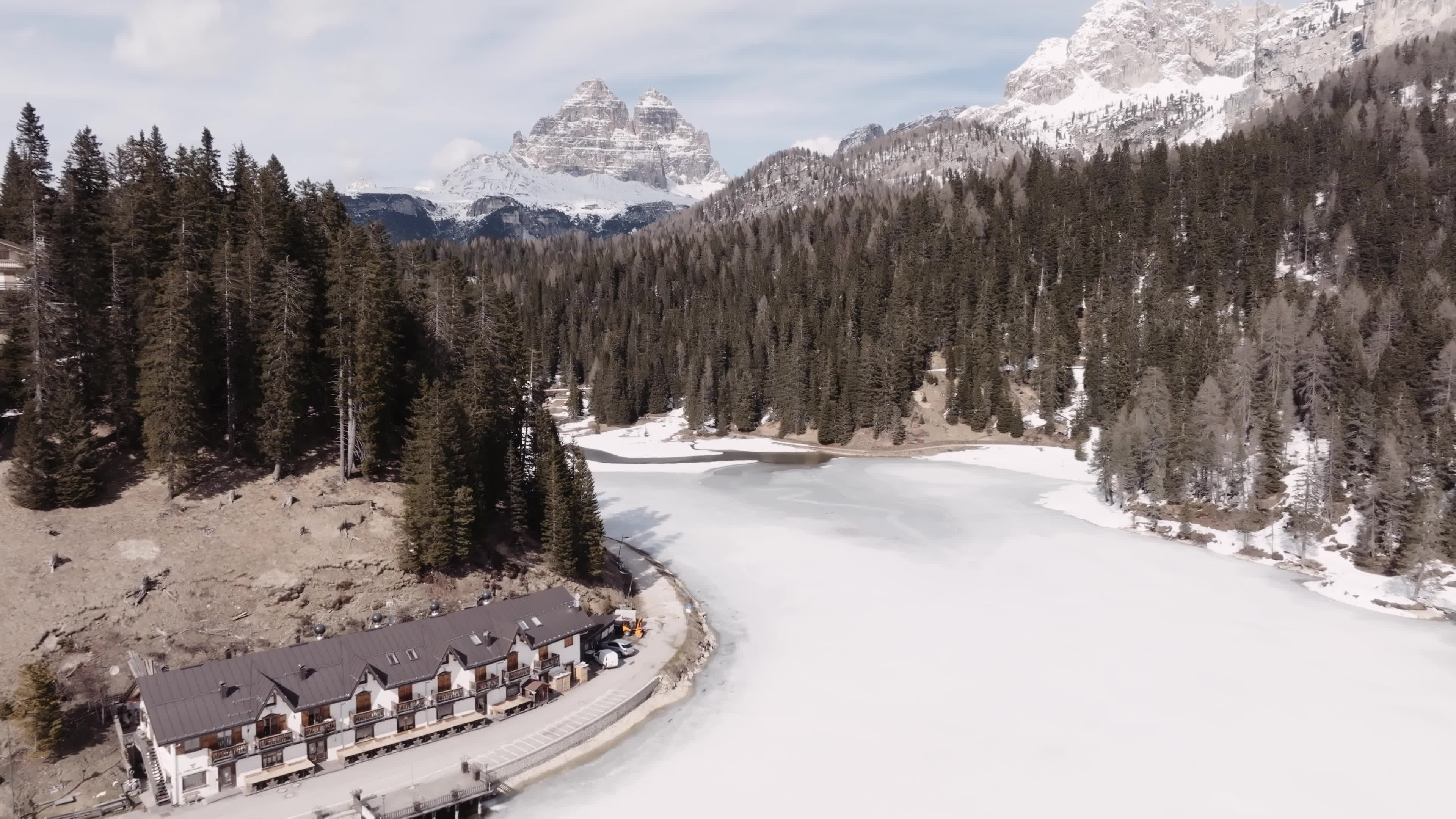 Drone View of Frozen Lake Misurina Covered in Snow