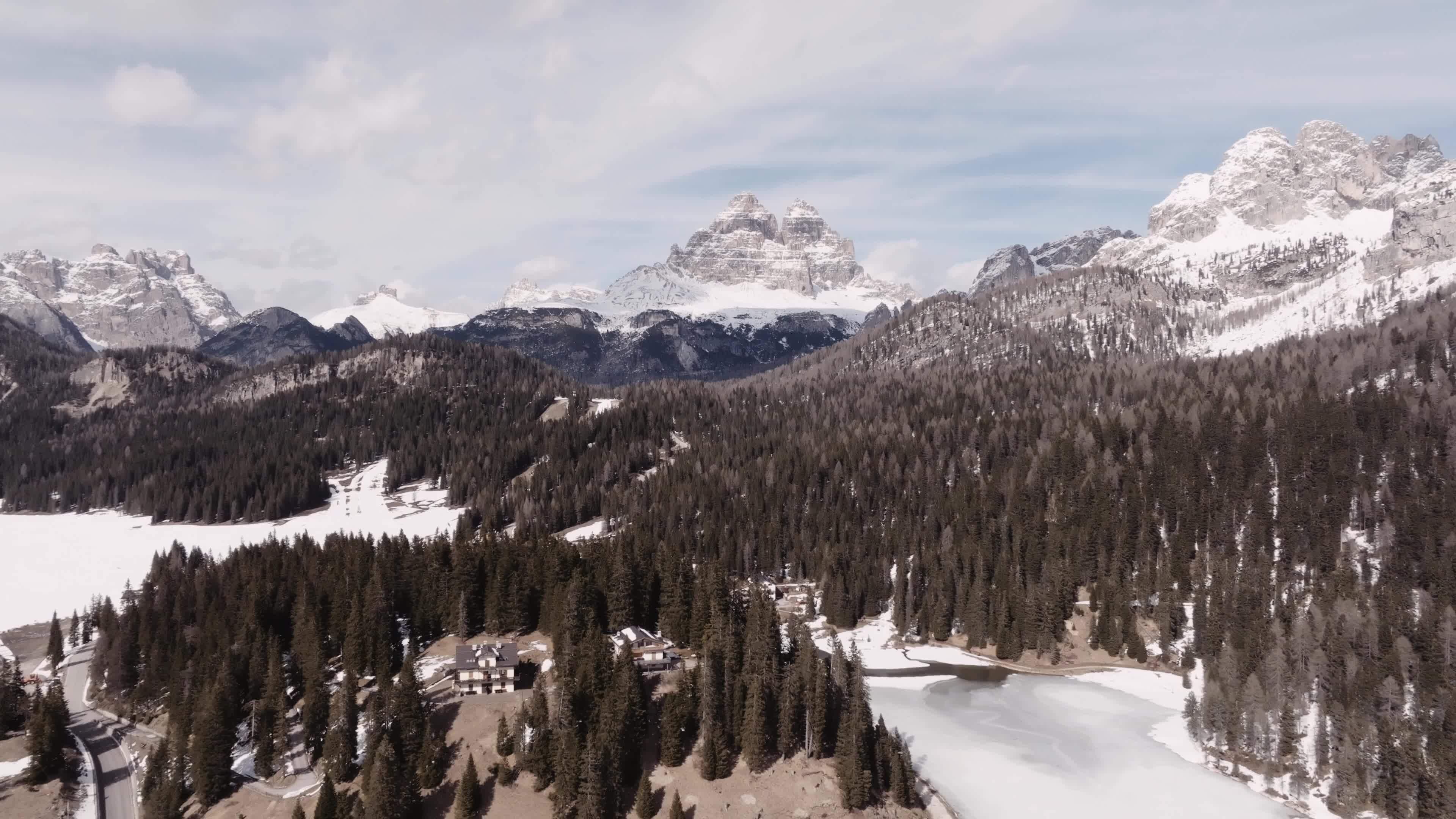 Drone View of Frozen Lake Misurina Covered in Snow