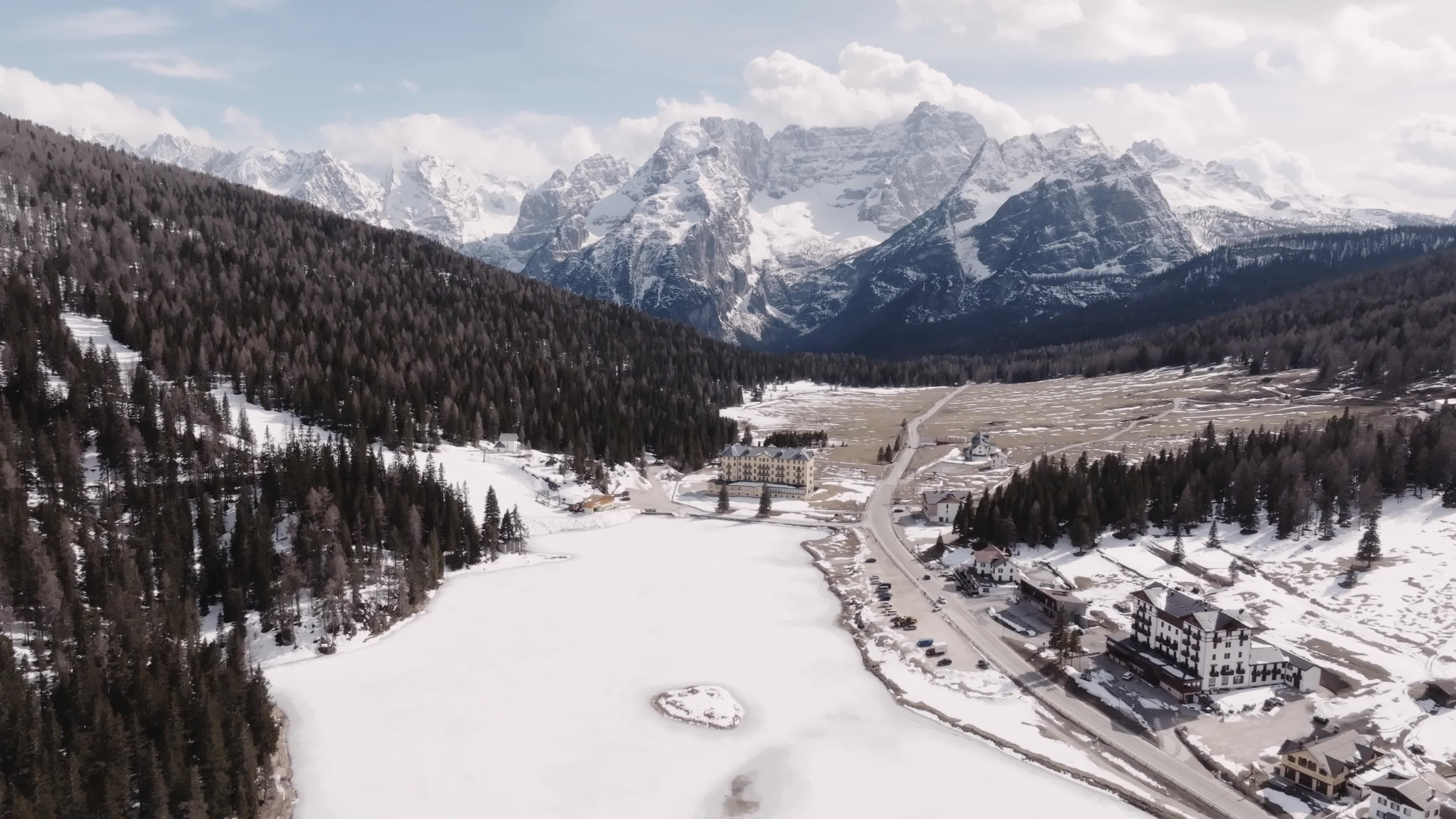 Drone View of Frozen Lake Misurina Covered in Snow