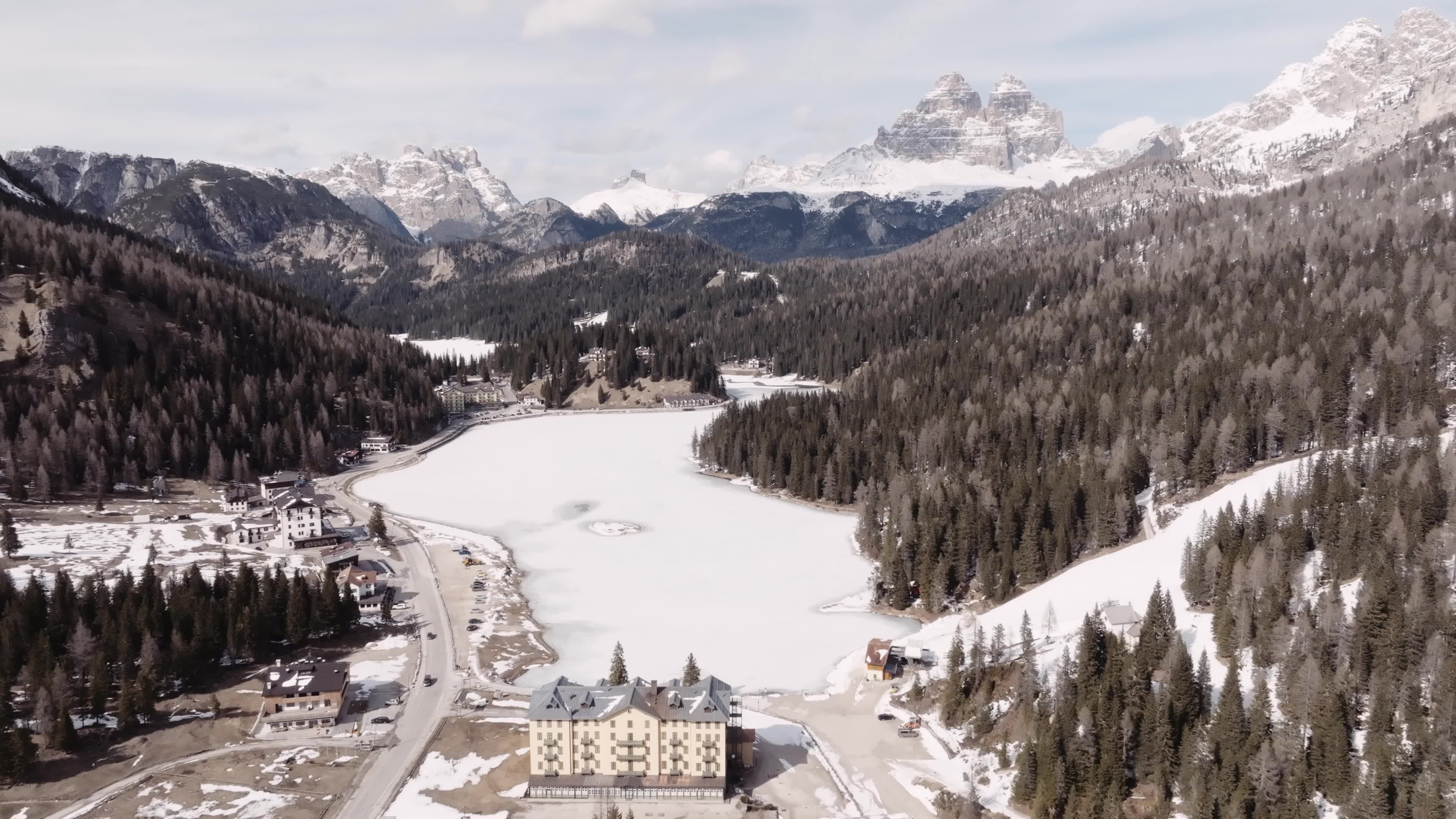 Drone View of Frozen Lake Misurina Covered in Snow