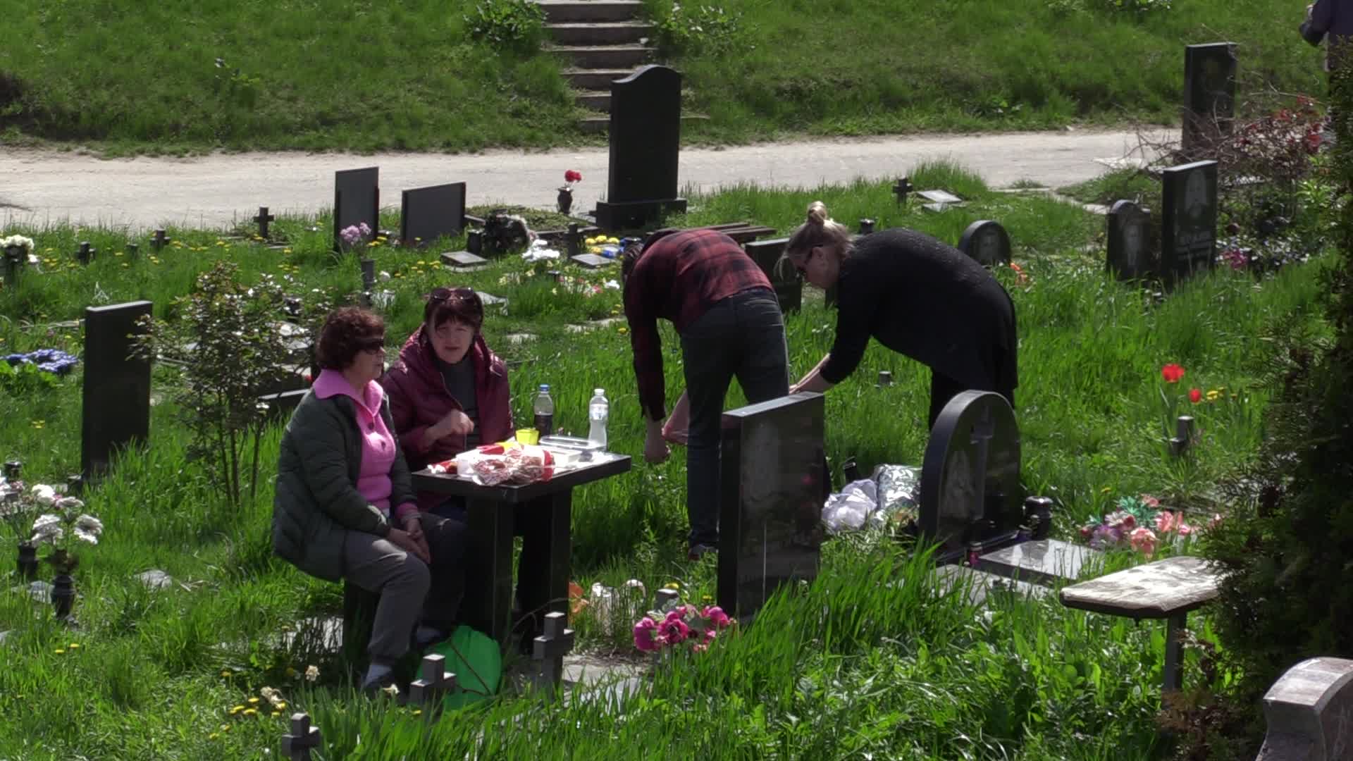 Ukrainians visit to graves of their deceased relatives during the memorial days in Kyiv, amid Russian invasion of Ukraine.