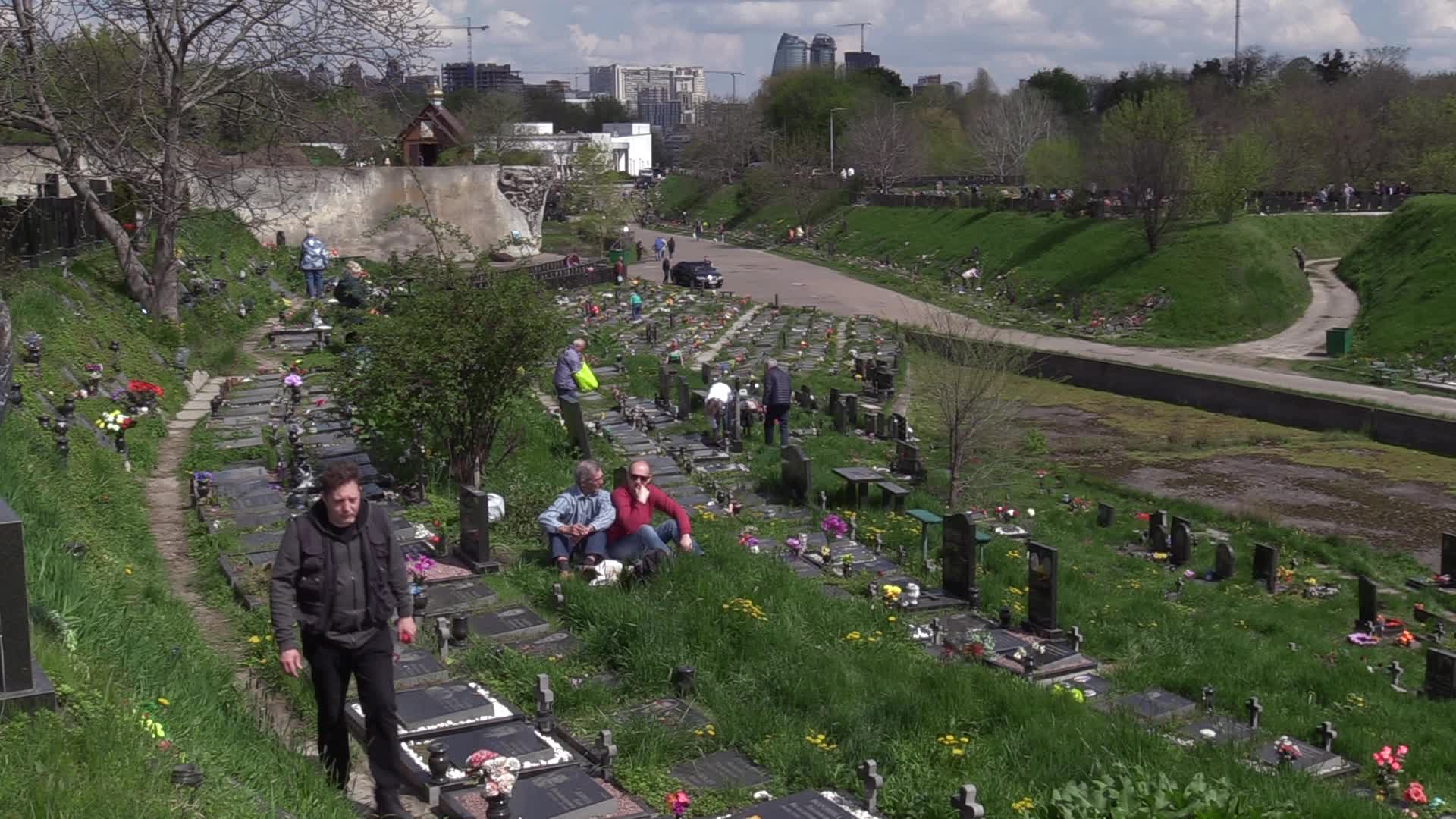 Ukrainians visit to graves of their deceased relatives during the memorial days in Kyiv, amid Russian invasion of Ukraine.