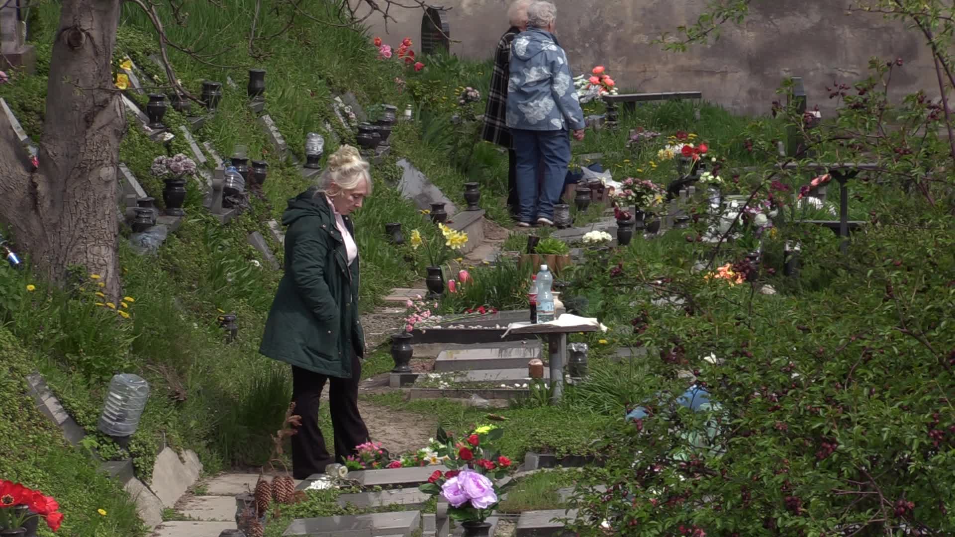 Ukrainians visit to graves of their deceased relatives during the memorial days in Kyiv, amid Russian invasion of Ukraine.
