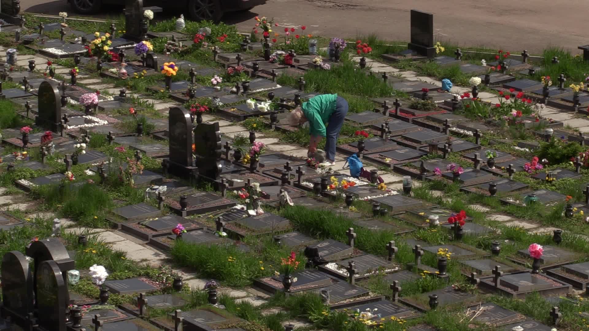 Ukrainians visit to graves of their deceased relatives during the memorial days in Kyiv, amid Russian invasion of Ukraine.