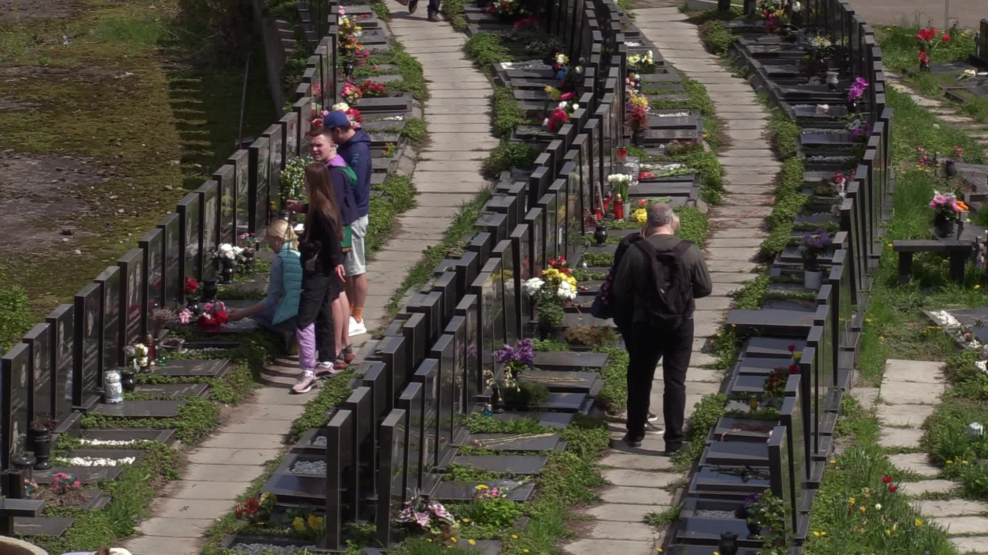 Ukrainians visit to graves of their deceased relatives during the memorial days in Kyiv, amid Russian invasion of Ukraine.
