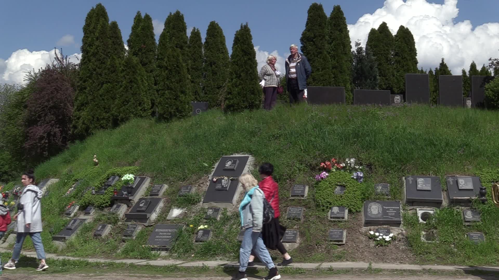 Ukrainians visit to graves of their deceased relatives during the memorial days in Kyiv, amid Russian invasion of Ukraine.