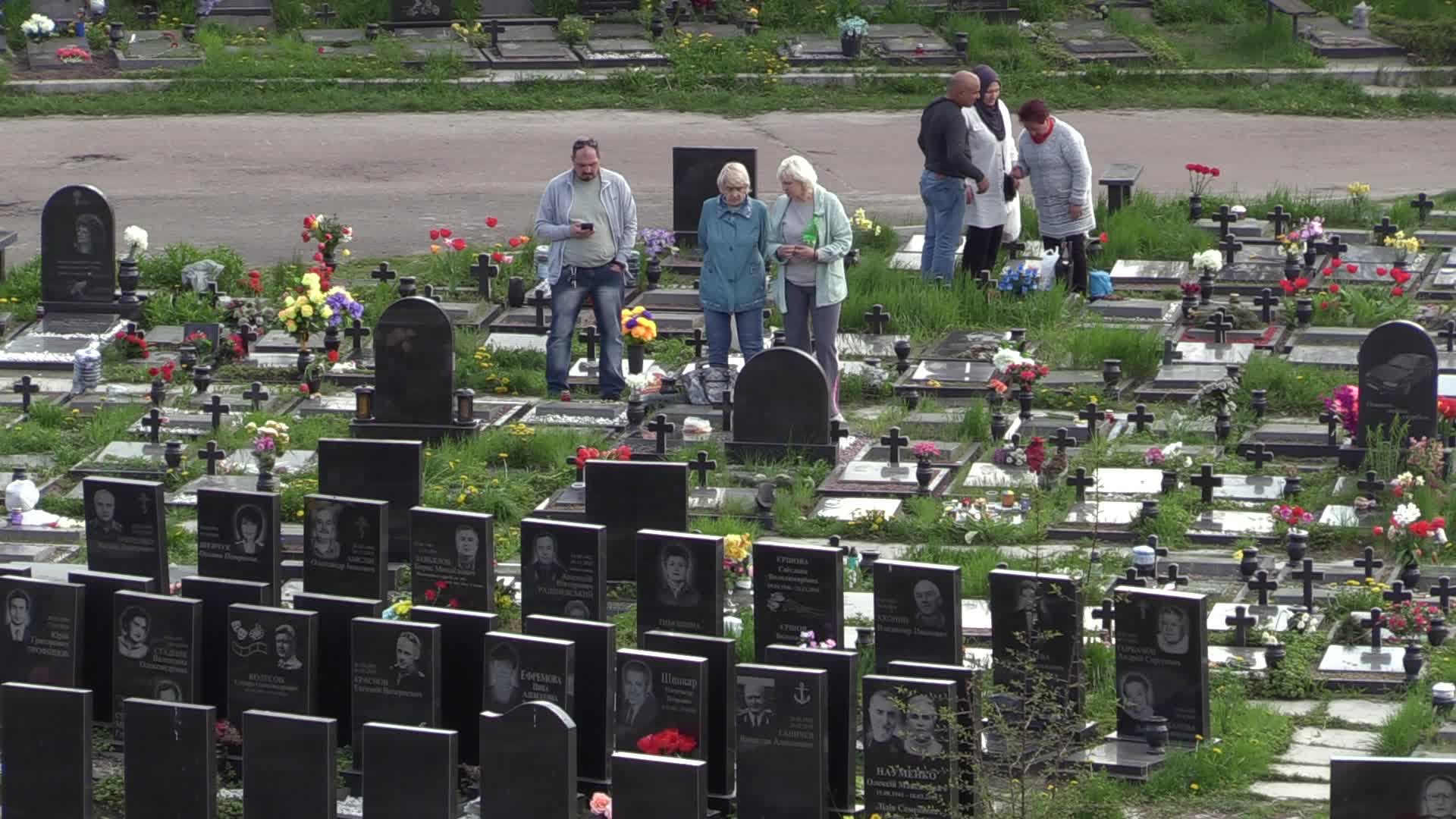 Ukrainians visit to graves of their deceased relatives during the memorial days in Kyiv, amid Russian invasion of Ukraine.