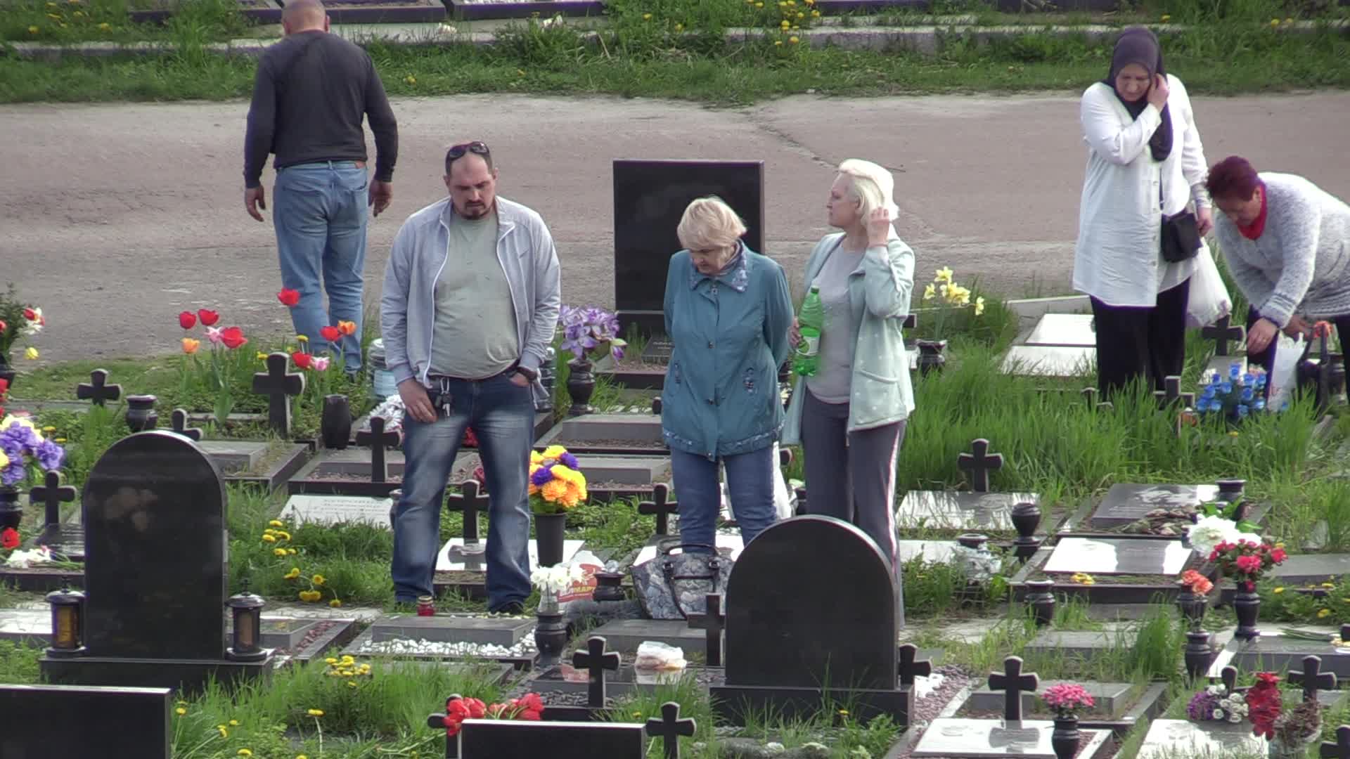 Ukrainians visit to graves of their deceased relatives during the memorial days in Kyiv, amid Russian invasion of Ukraine.
