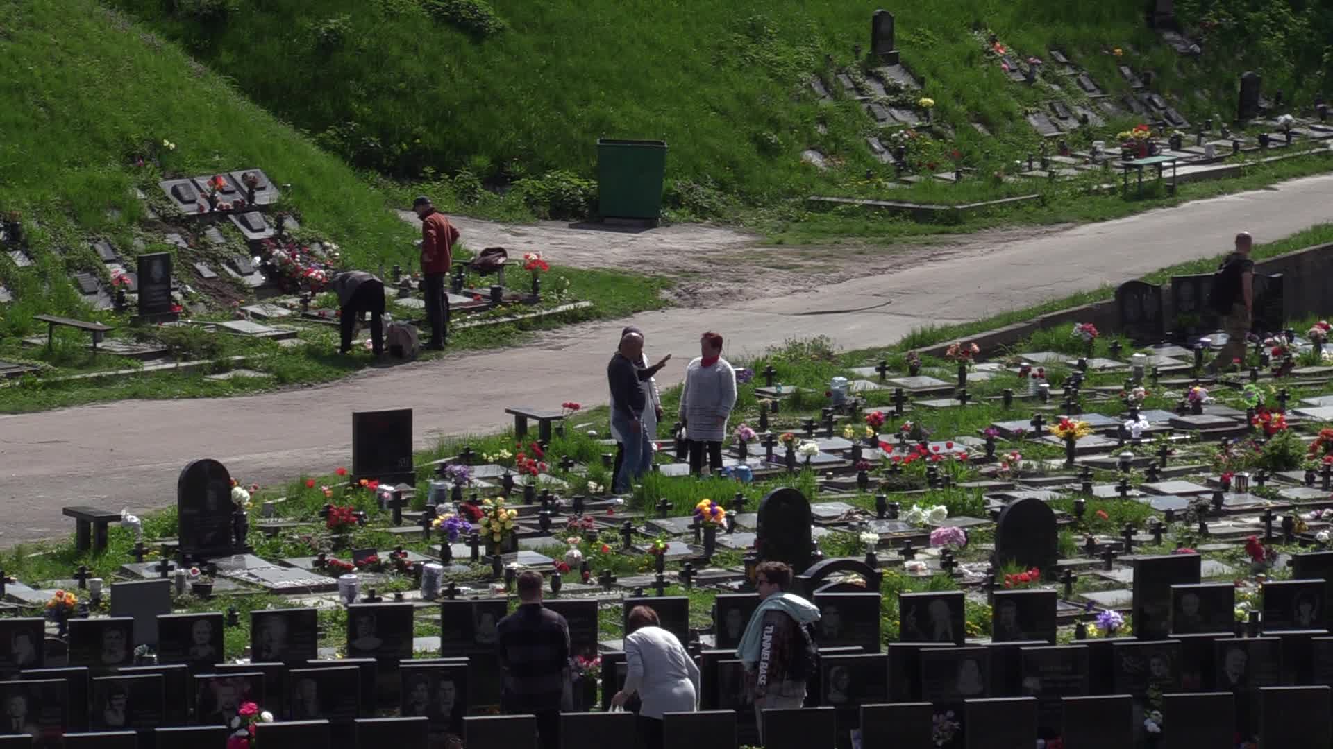 Ukrainians visit to graves of their deceased relatives during the memorial days in Kyiv, amid Russian invasion of Ukraine.