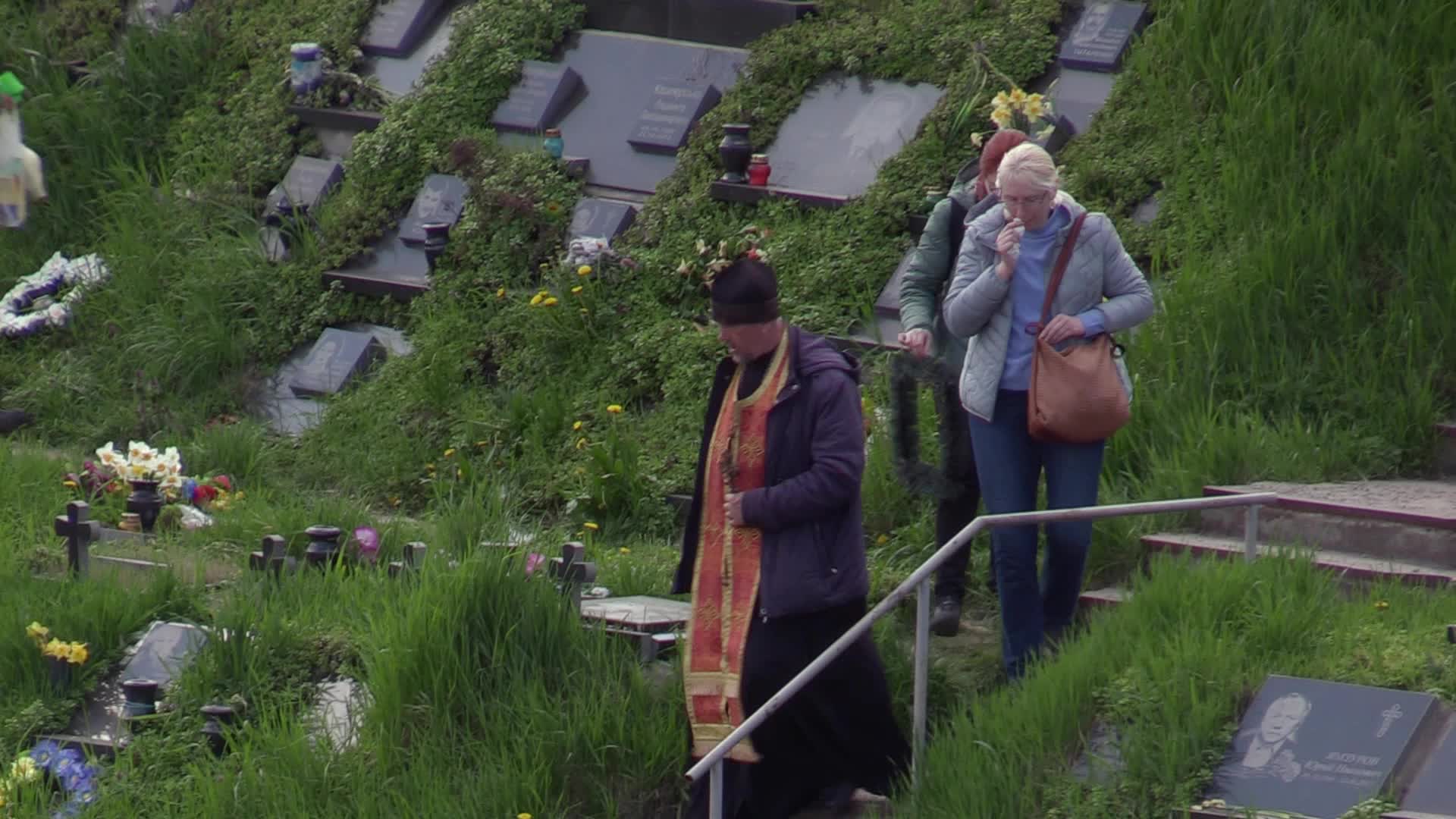 Ukrainians visit to graves of their deceased relatives during the memorial days in Kyiv, amid Russian invasion of Ukraine.