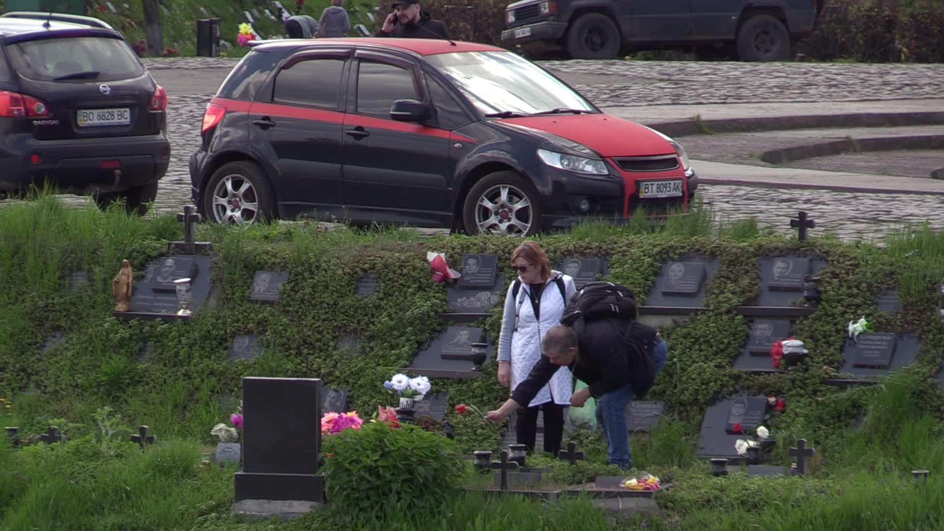 Ukrainians visit to graves of their deceased relatives during the memorial days in Kyiv, amid Russian invasion of Ukraine.