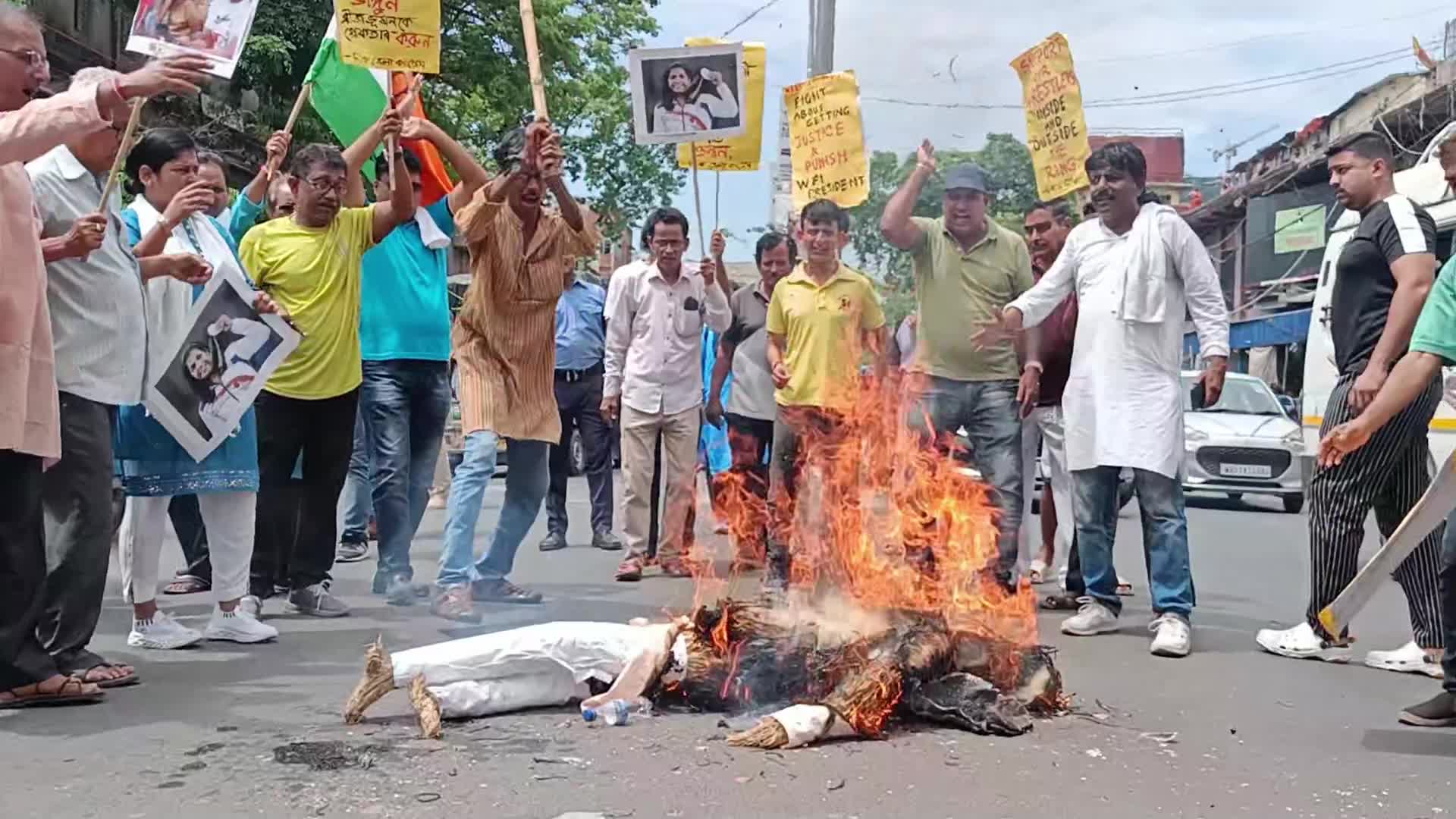 Congress workers protest against the Wrestling Federation of India president Brij Bhushan Sharan Singh