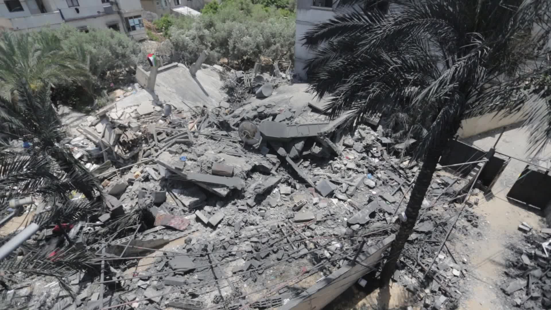 Palestinians inspect damage following Israeli air strikes