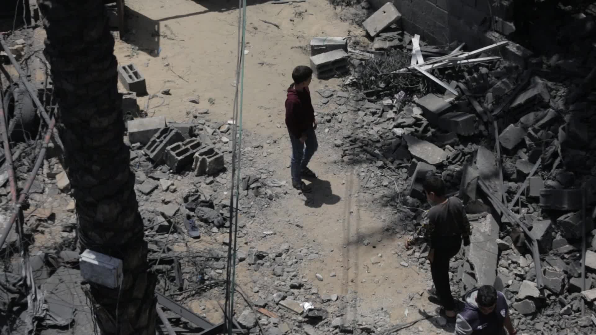 Palestinians inspect damage following Israeli air strikes