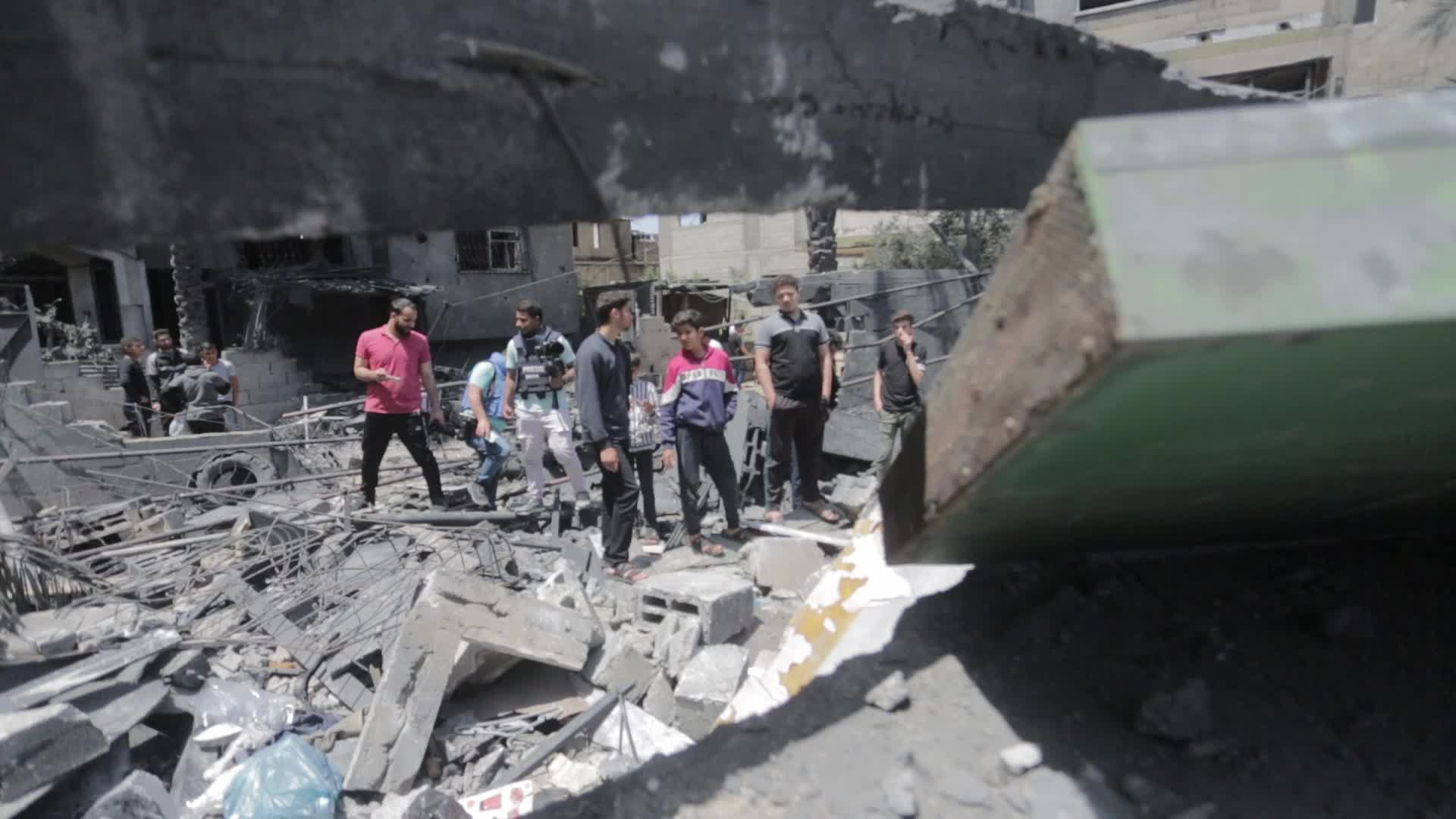 Palestinians inspect damage following Israeli air strikes