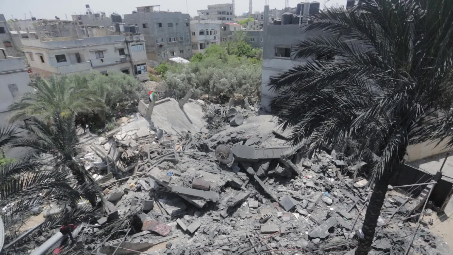 Palestinians inspect damage following Israeli air strikes