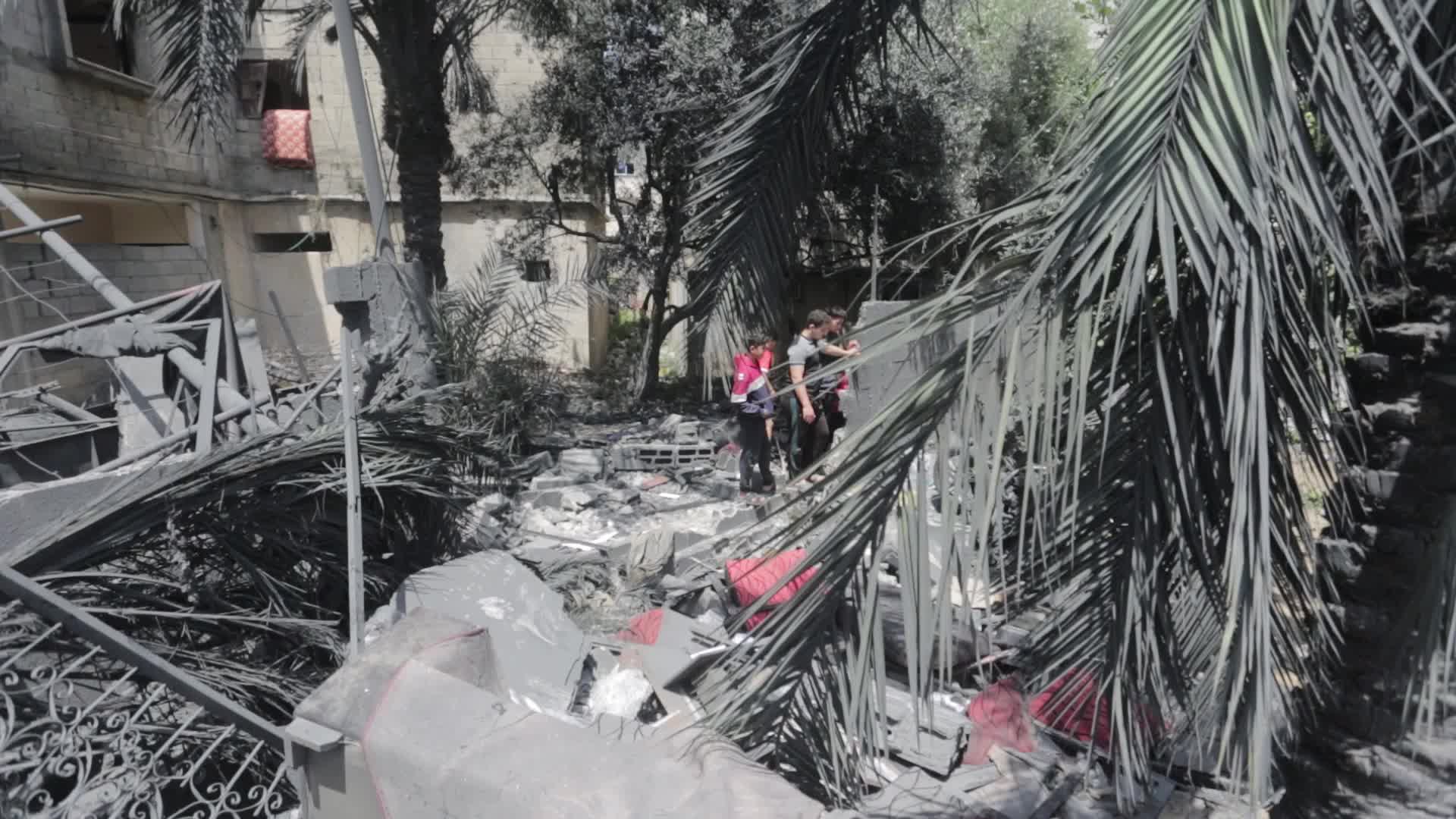 Palestinians inspect damage following Israeli air strikes